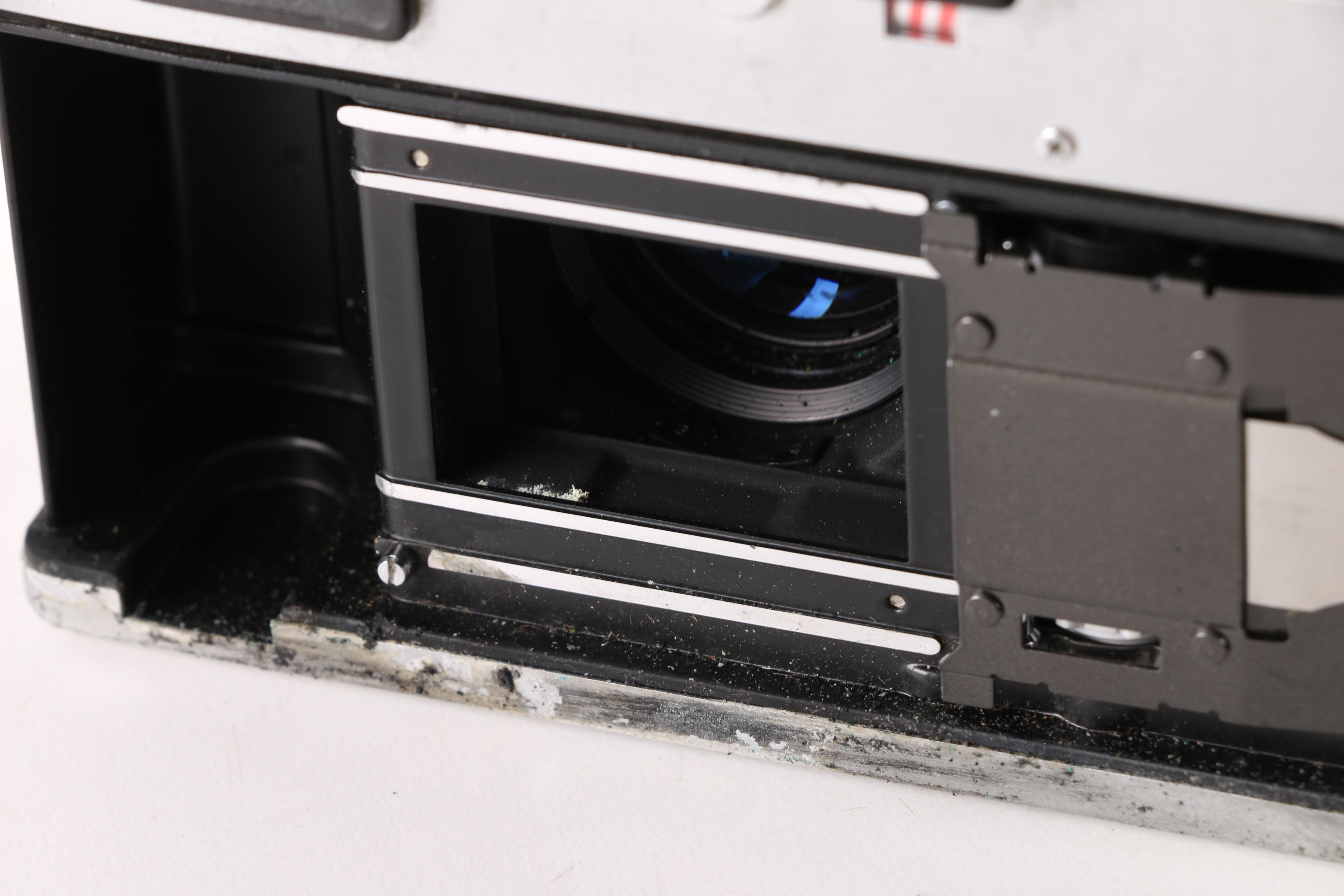 Vintage Canon QL19 35mm Rangefinder Camera with Metz 181 Flash