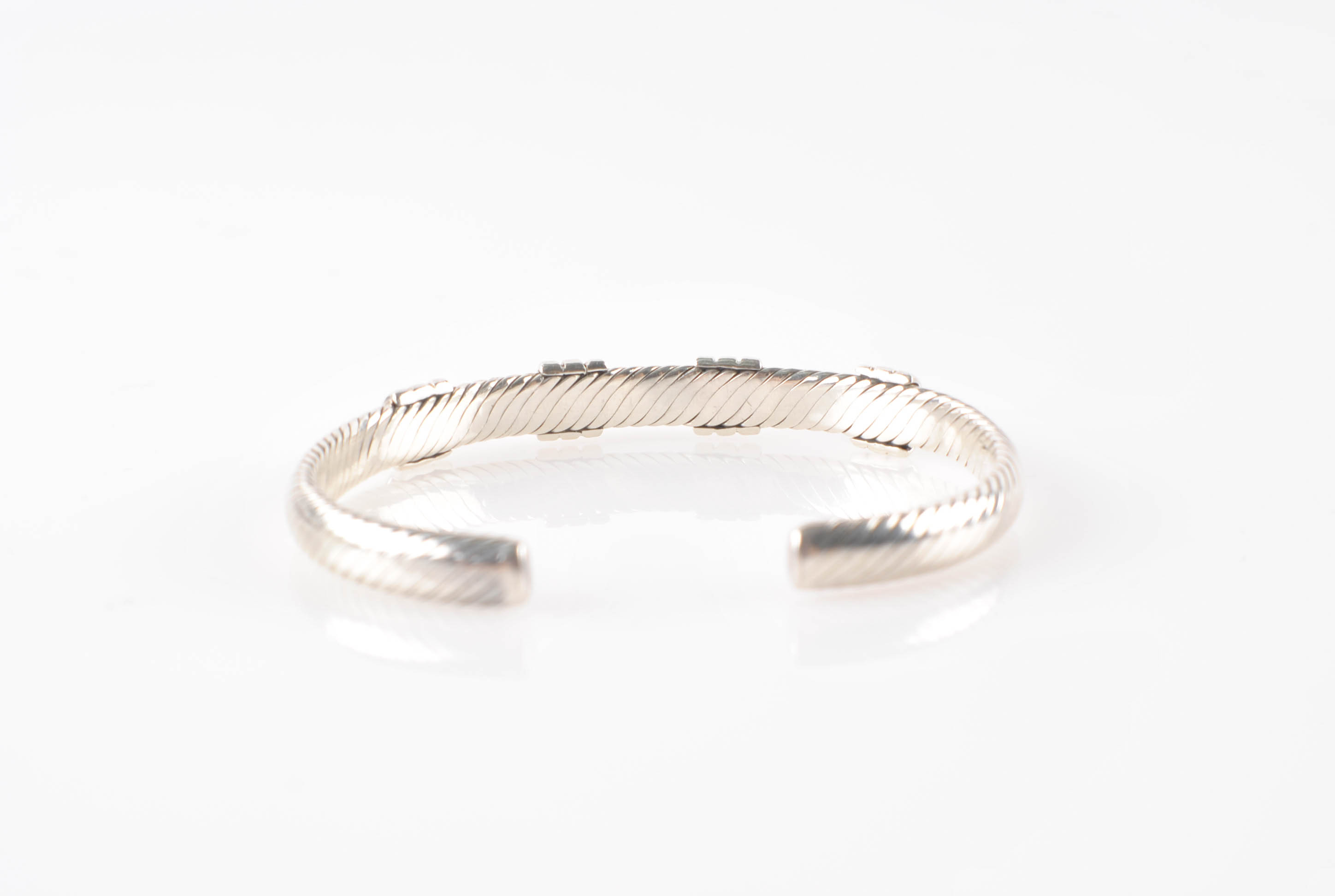 Collection of Vintage Mexican Sterling Bracelets Including Taxco