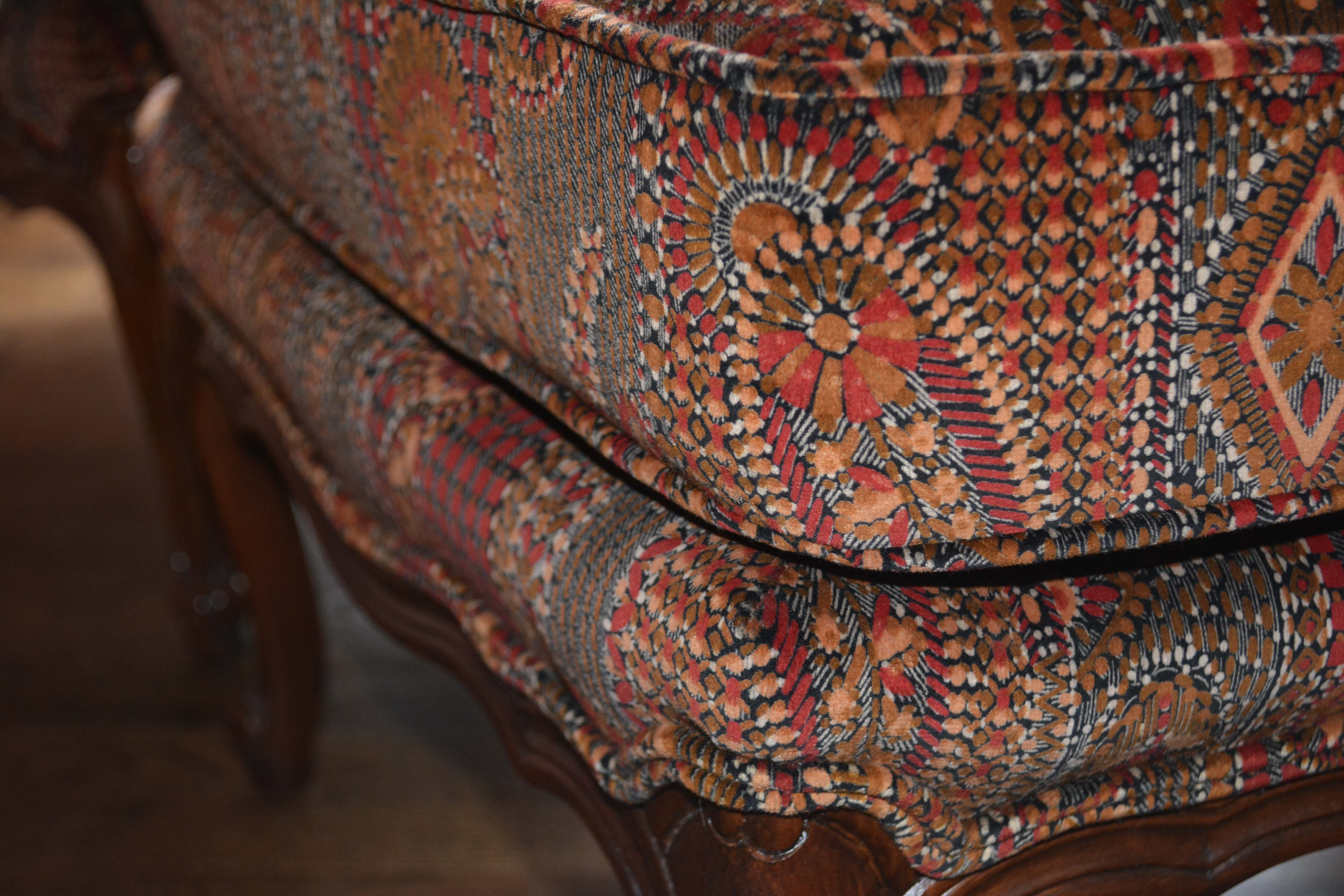 Vintage Louis XV Style Upholstered Armchair and Ottoman by Baker Furniture