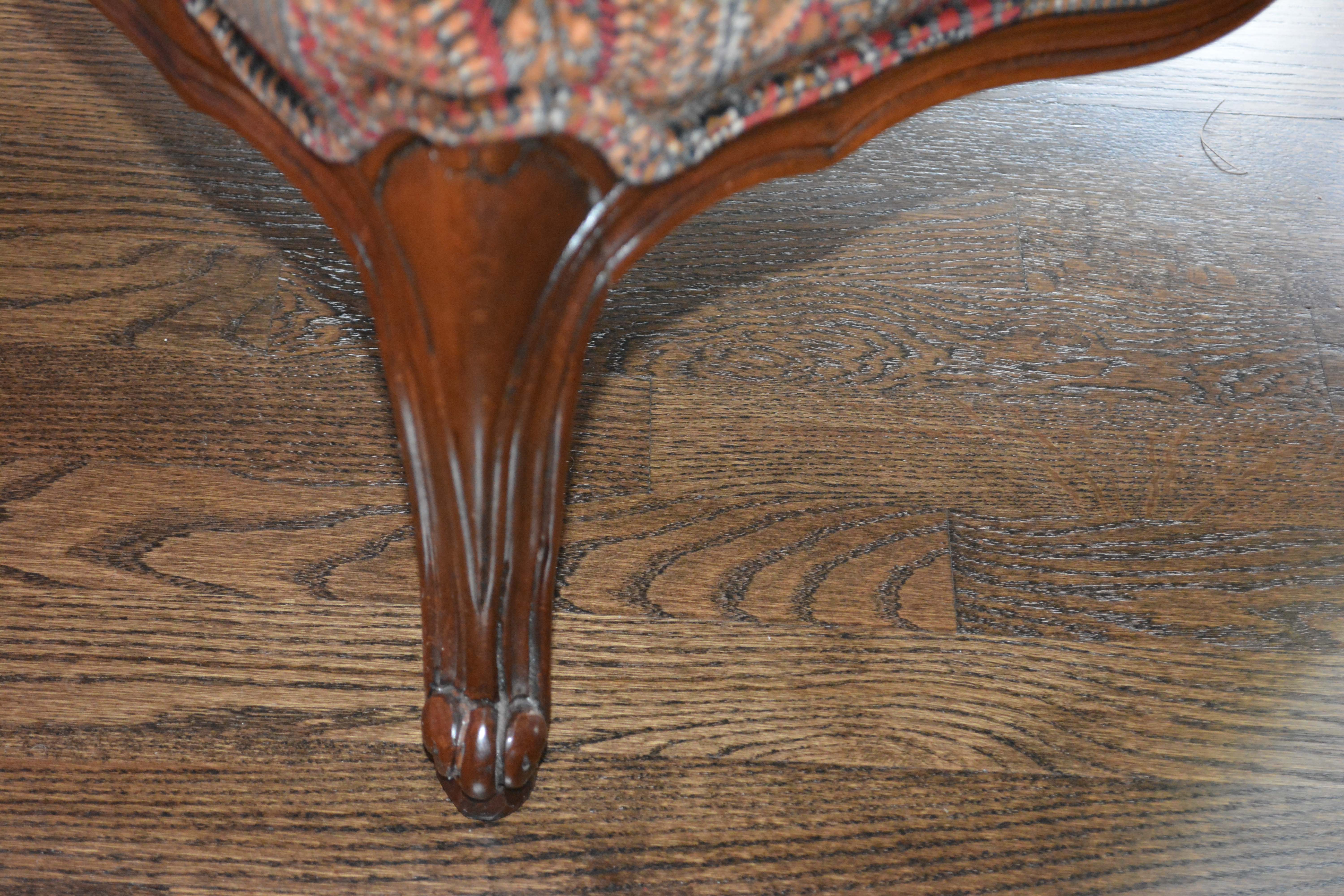 Vintage Louis XV Style Upholstered Armchair and Ottoman by Baker Furniture