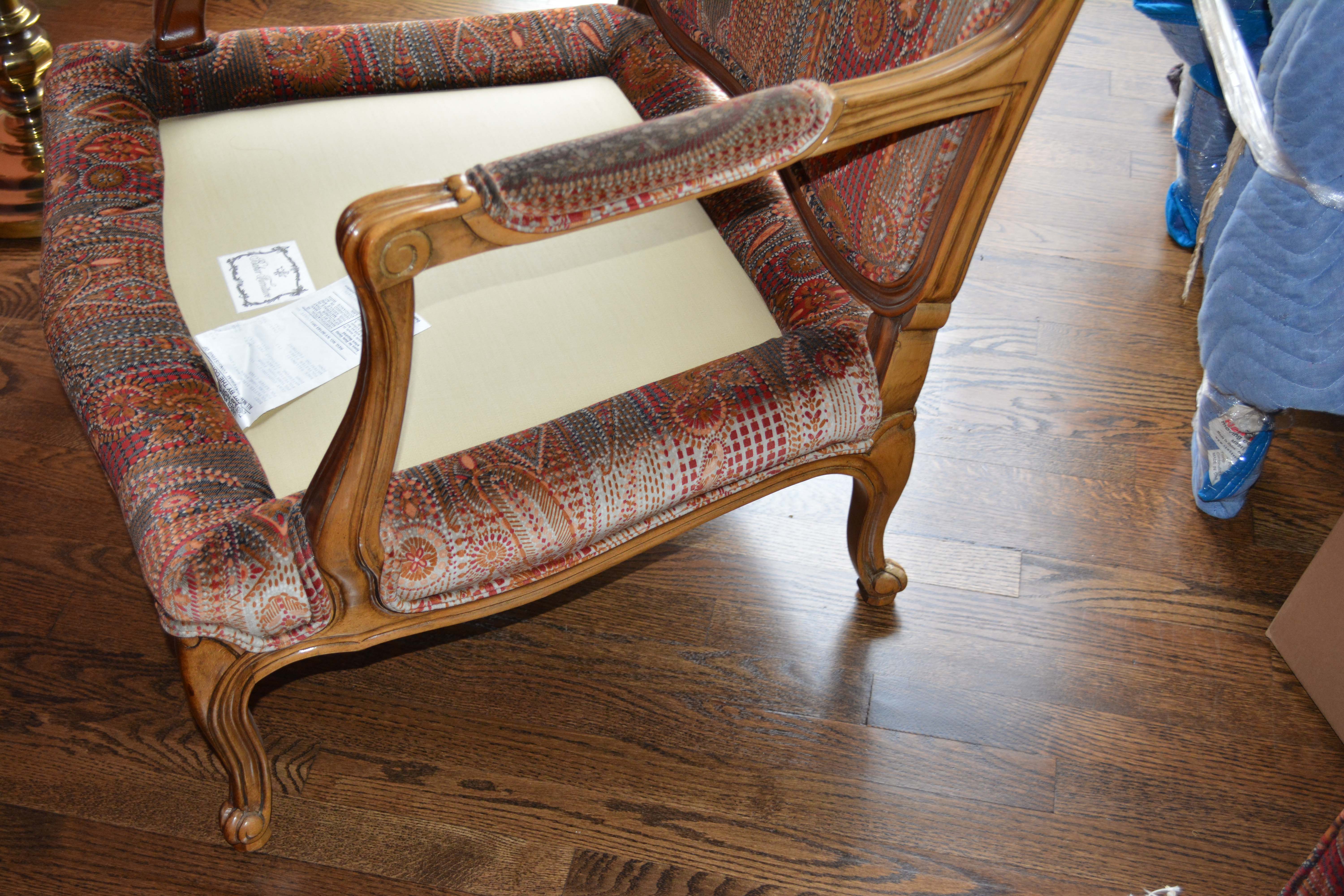 Vintage Louis XV Style Upholstered Armchair and Ottoman by Baker Furniture