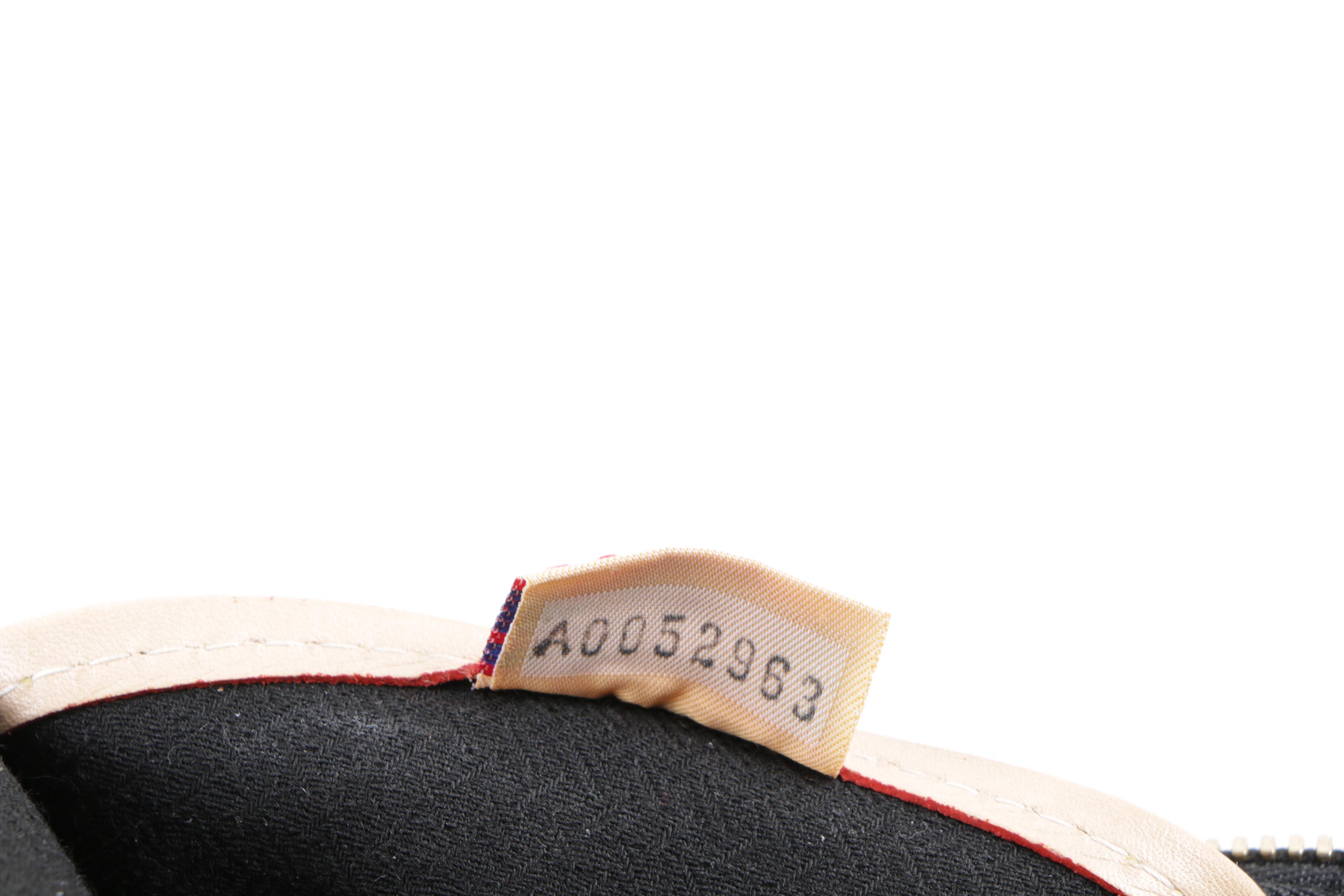 Dooney & Bourke Canvas and Leather Handbag