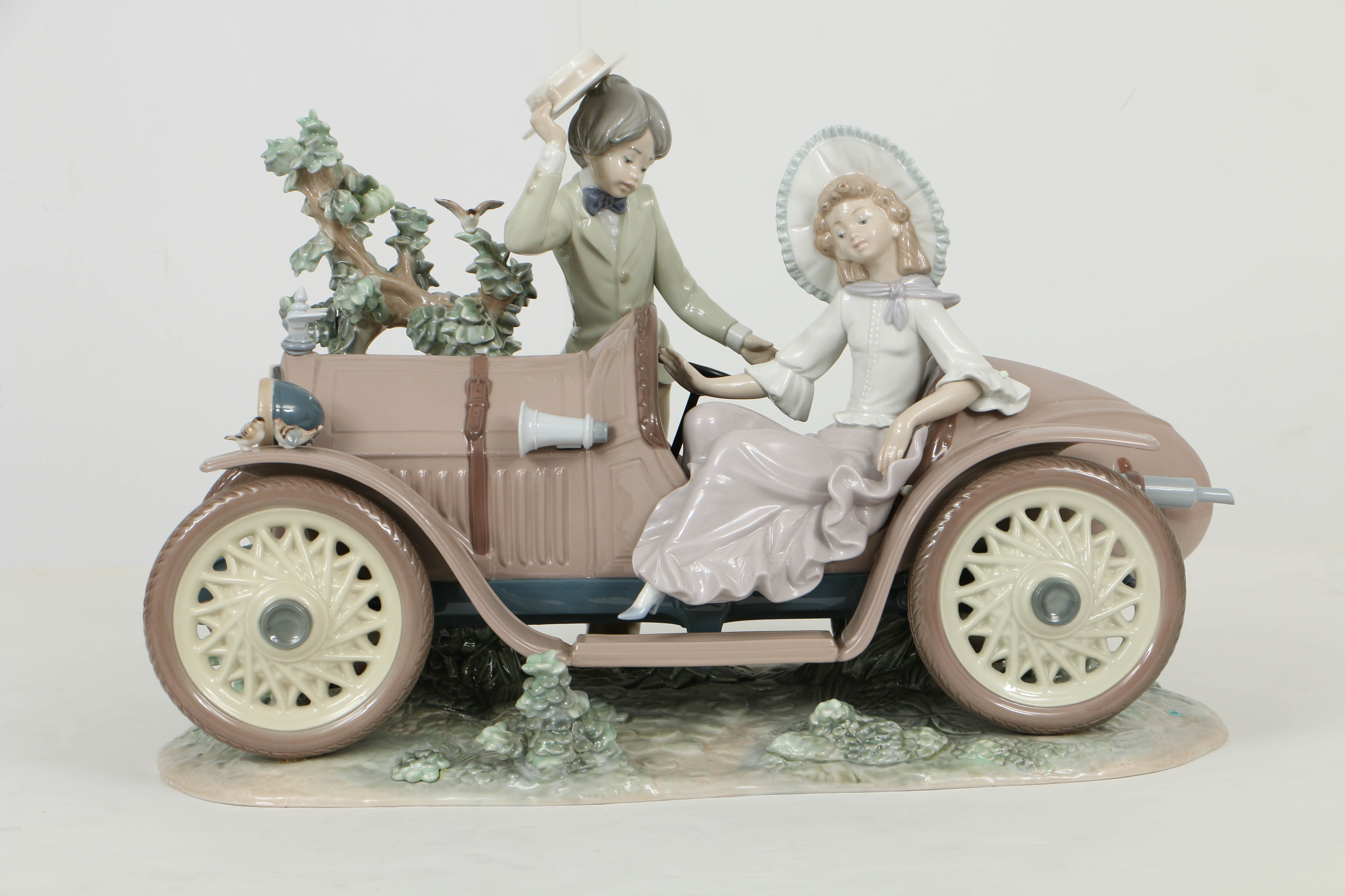 Limited Edition Lladro Figurine Of a "Young Couple with Car"
