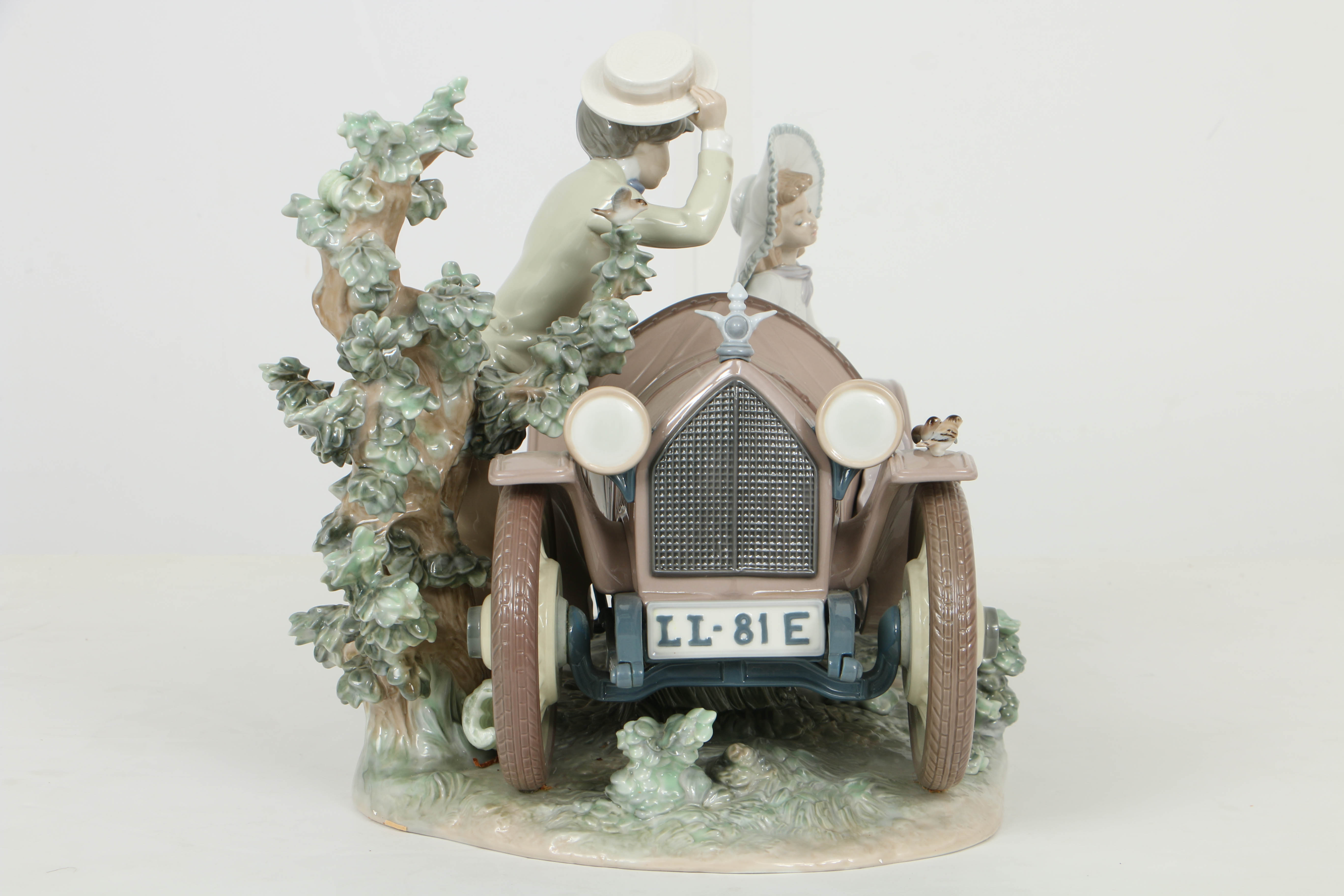 Limited Edition Lladro Figurine Of a "Young Couple with Car"