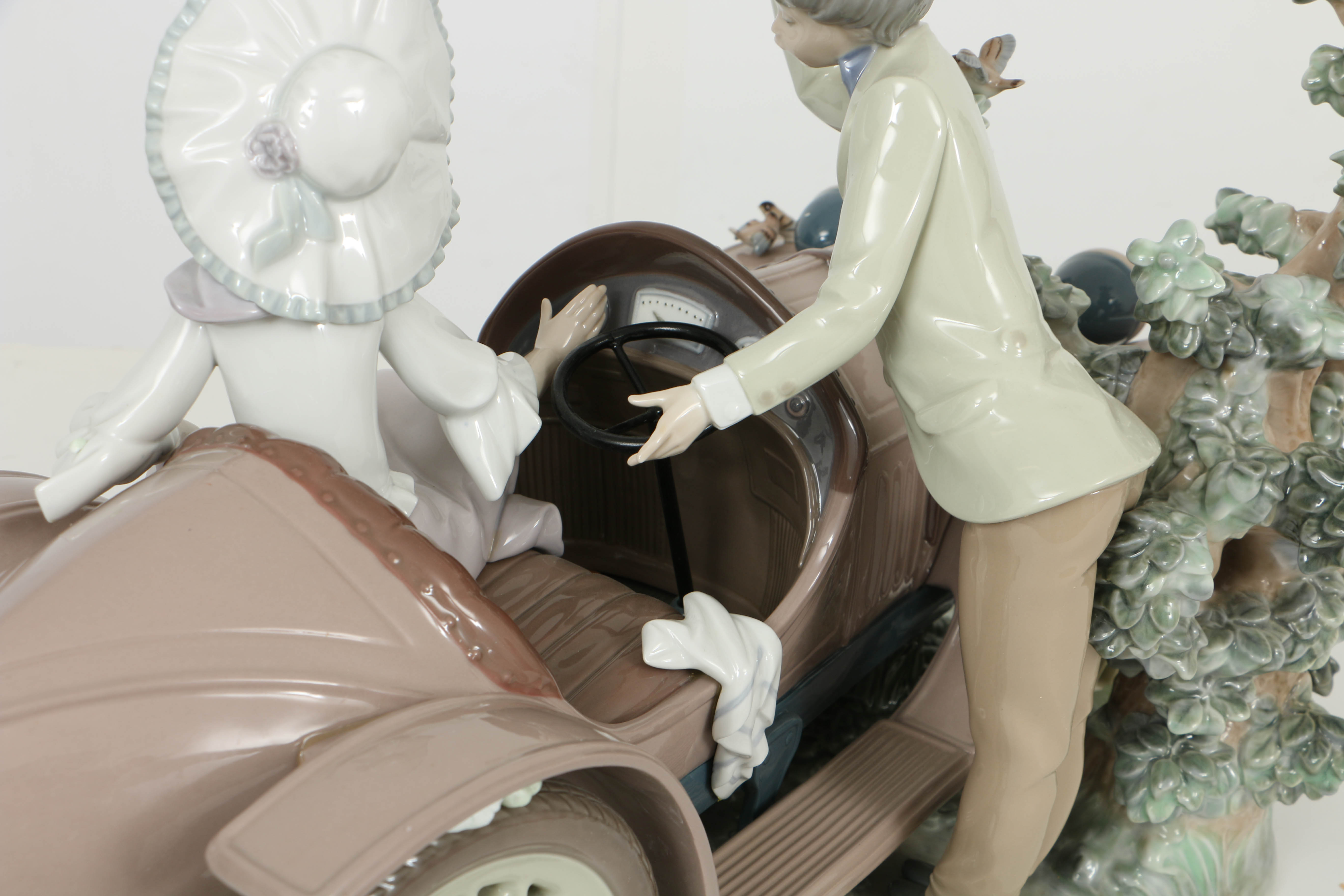 Limited Edition Lladro Figurine Of a "Young Couple with Car"