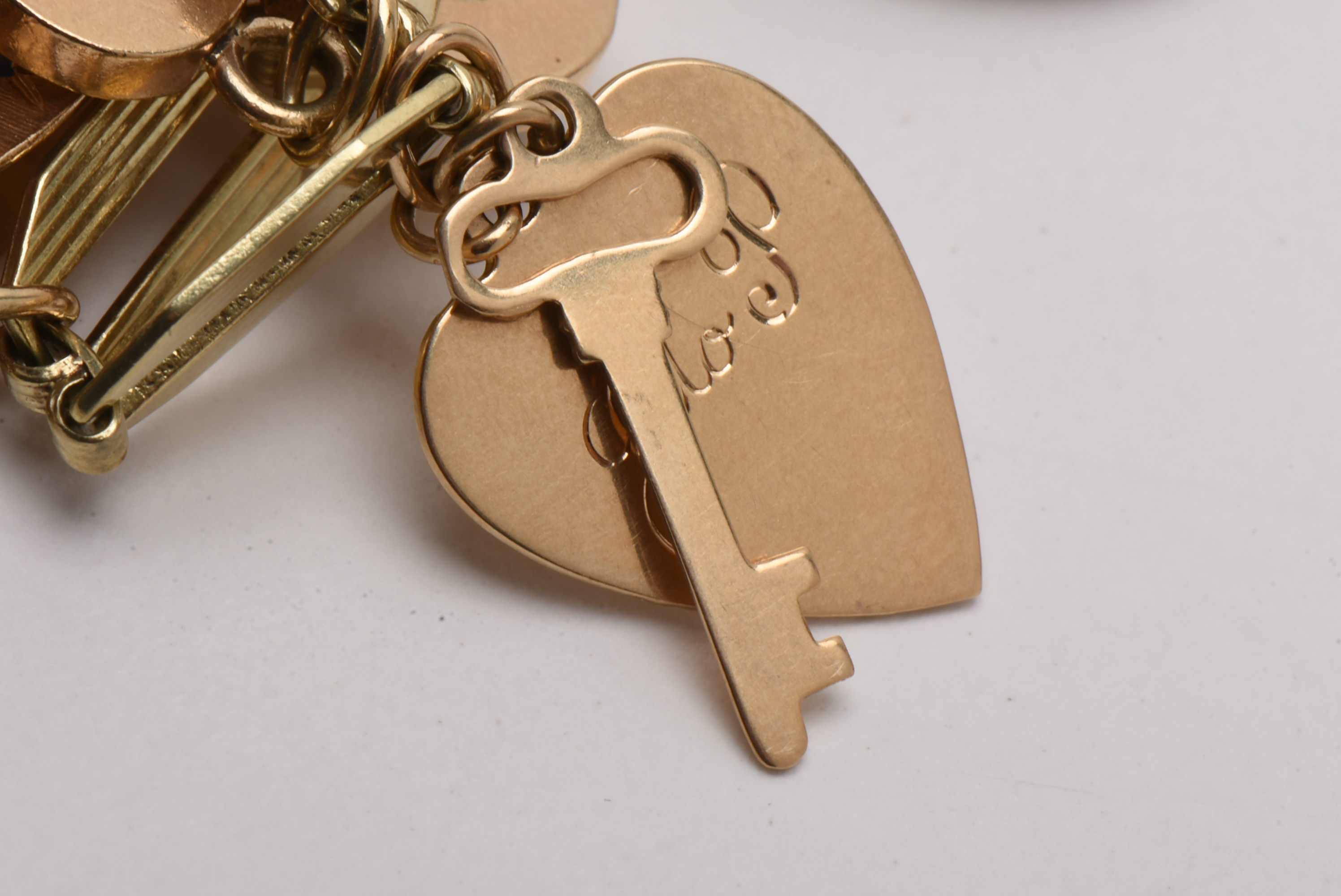 Vintage 14K Yellow Gold Charm Bracelet with Gold Charms and Gemstones