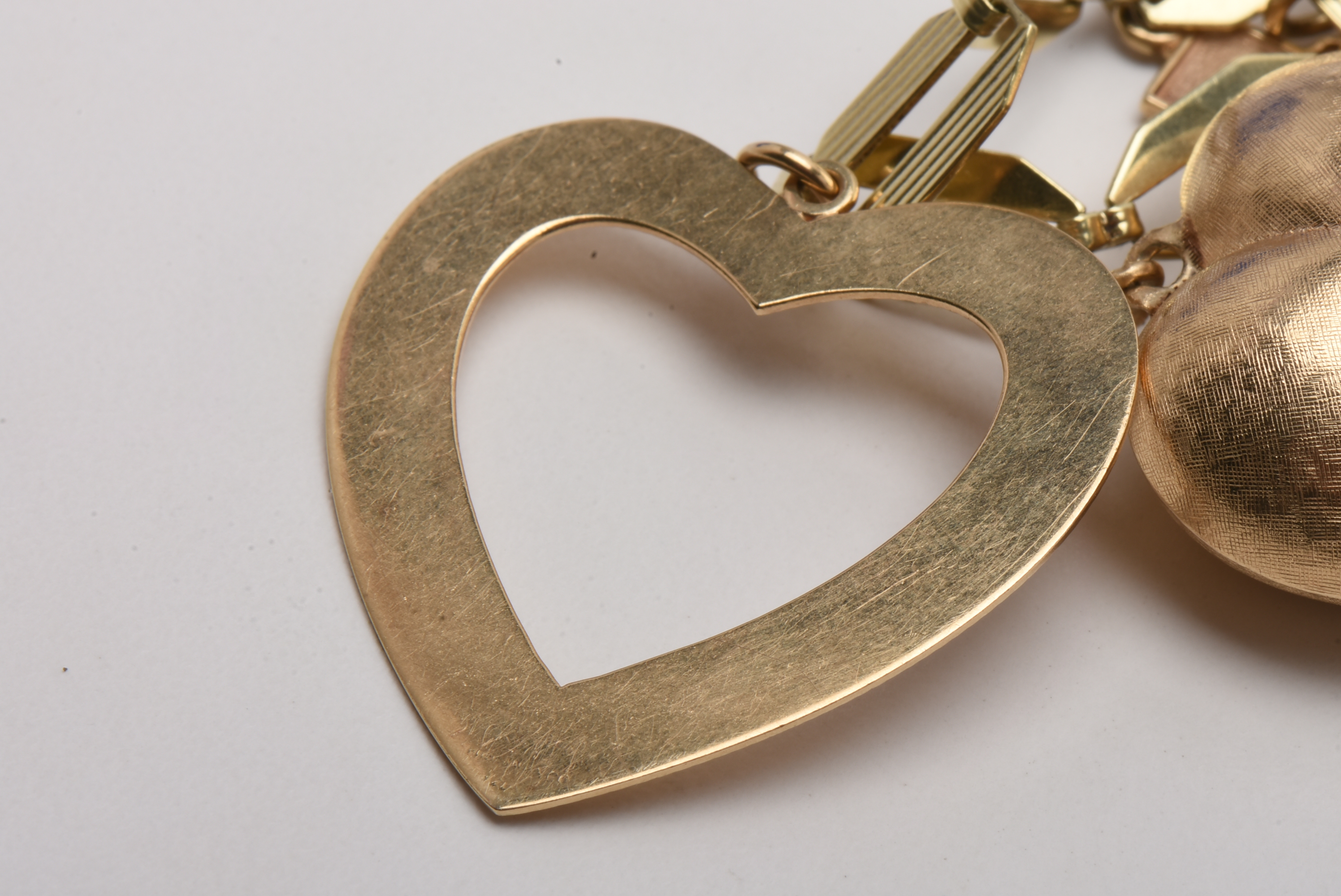 Vintage 14K Yellow Gold Charm Bracelet with Gold Charms and Gemstones