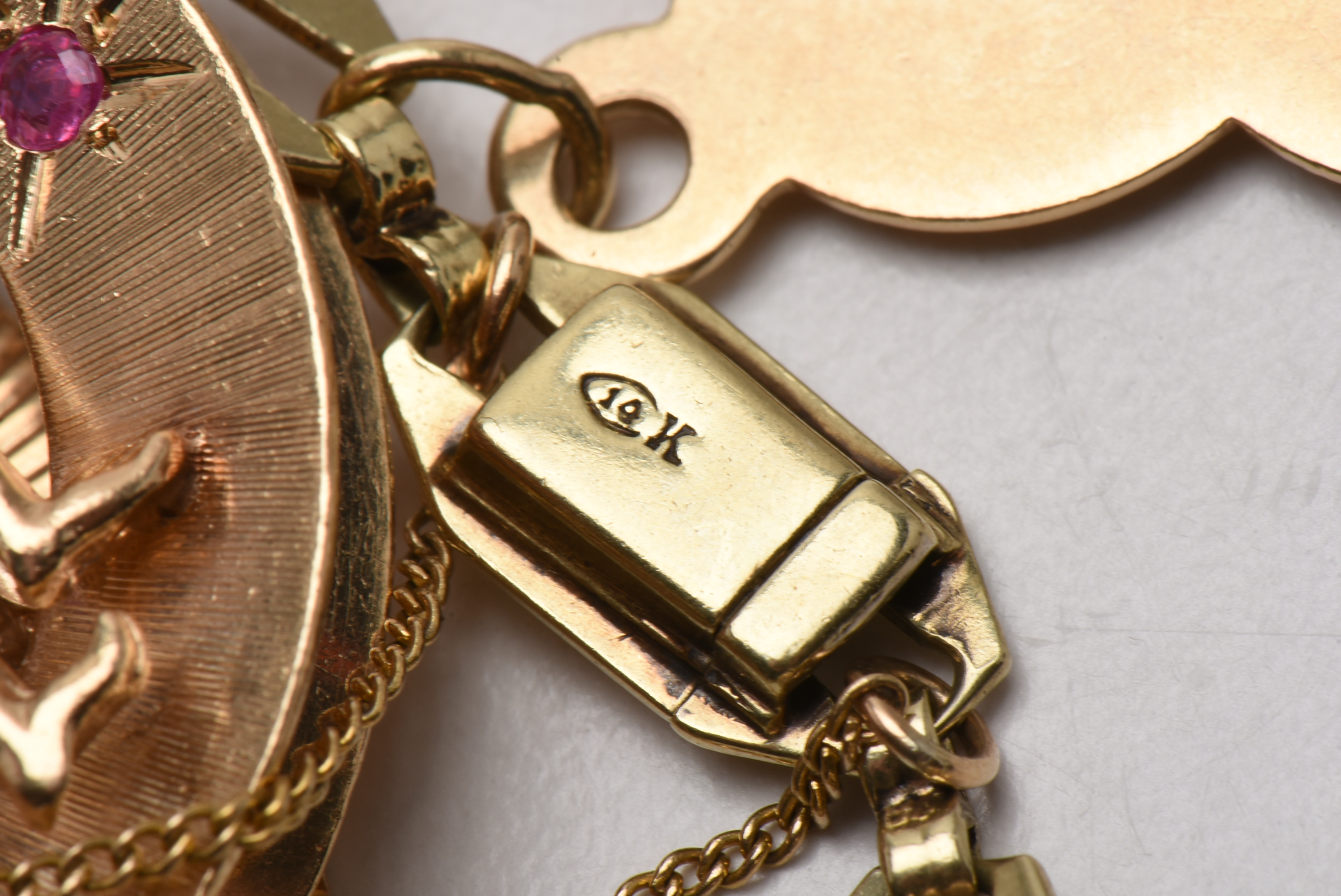 Vintage 14K Yellow Gold Charm Bracelet with Gold Charms and Gemstones