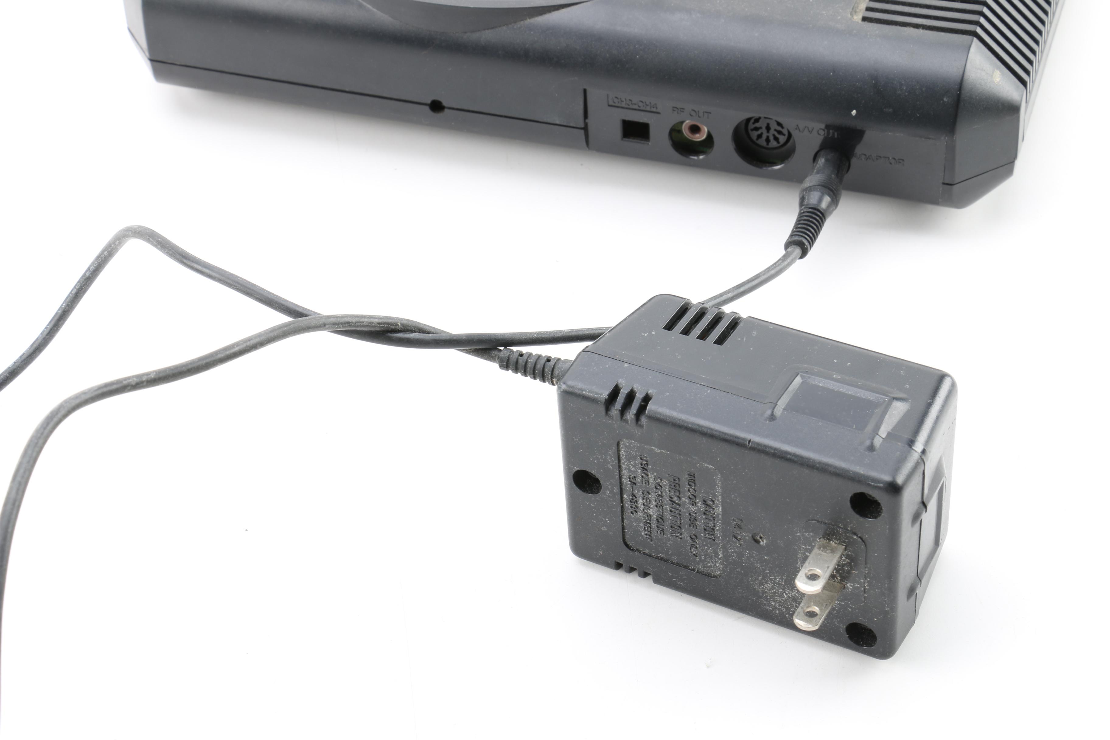 Sega Genesis Game Console with Controllers and "NBA Live 96"