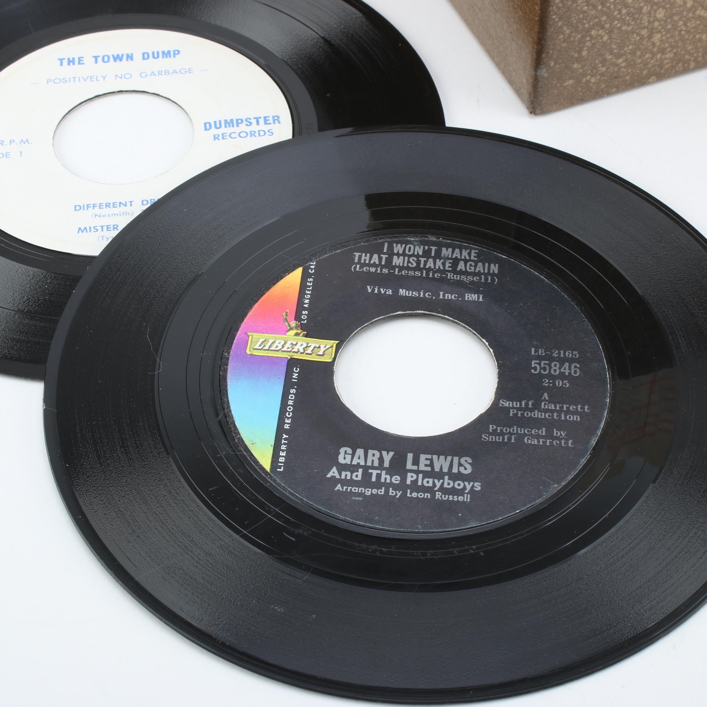 Metal Case of 45 rpm Records Including The Rolling Stones