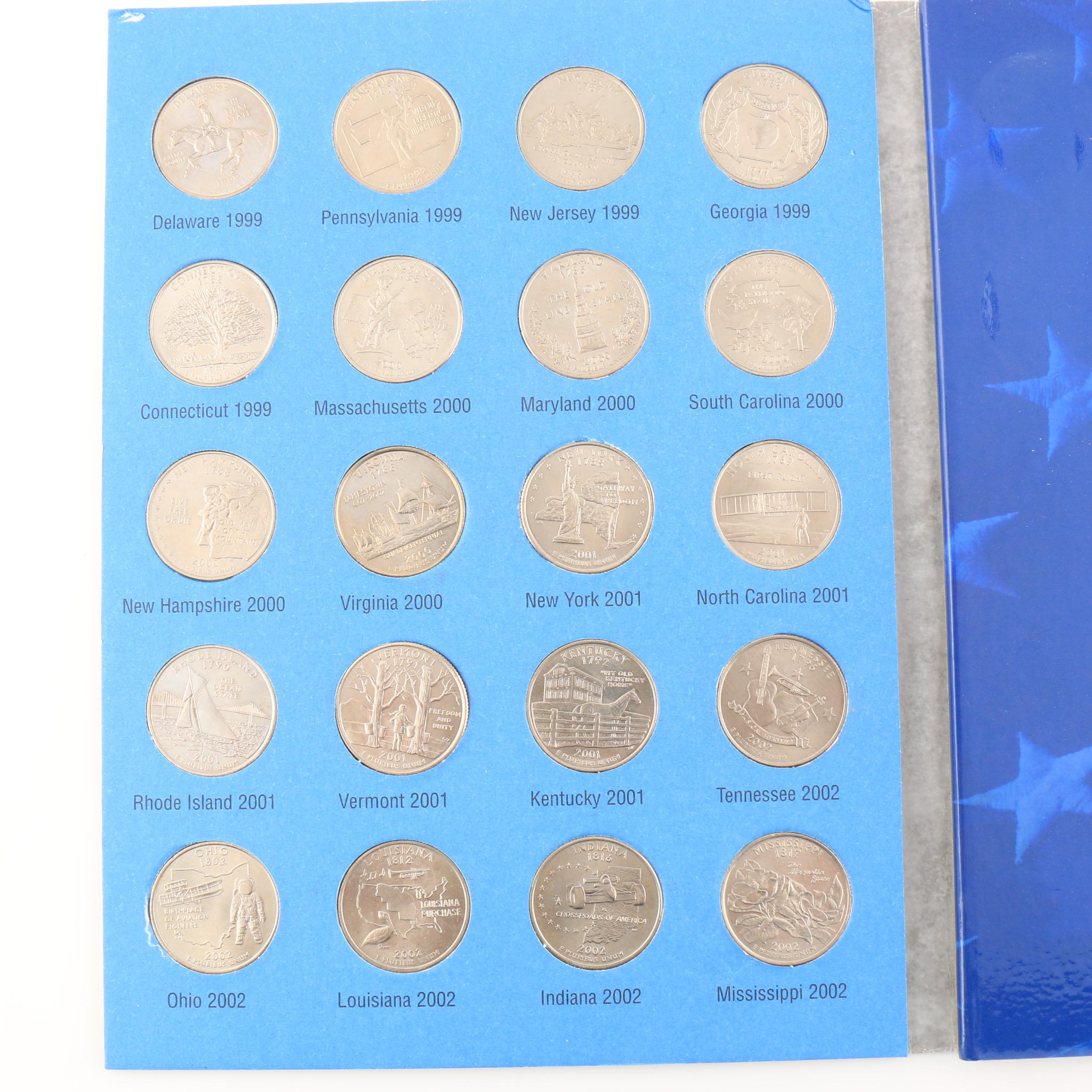 Two Binders of U.S. Statehood Quarters
