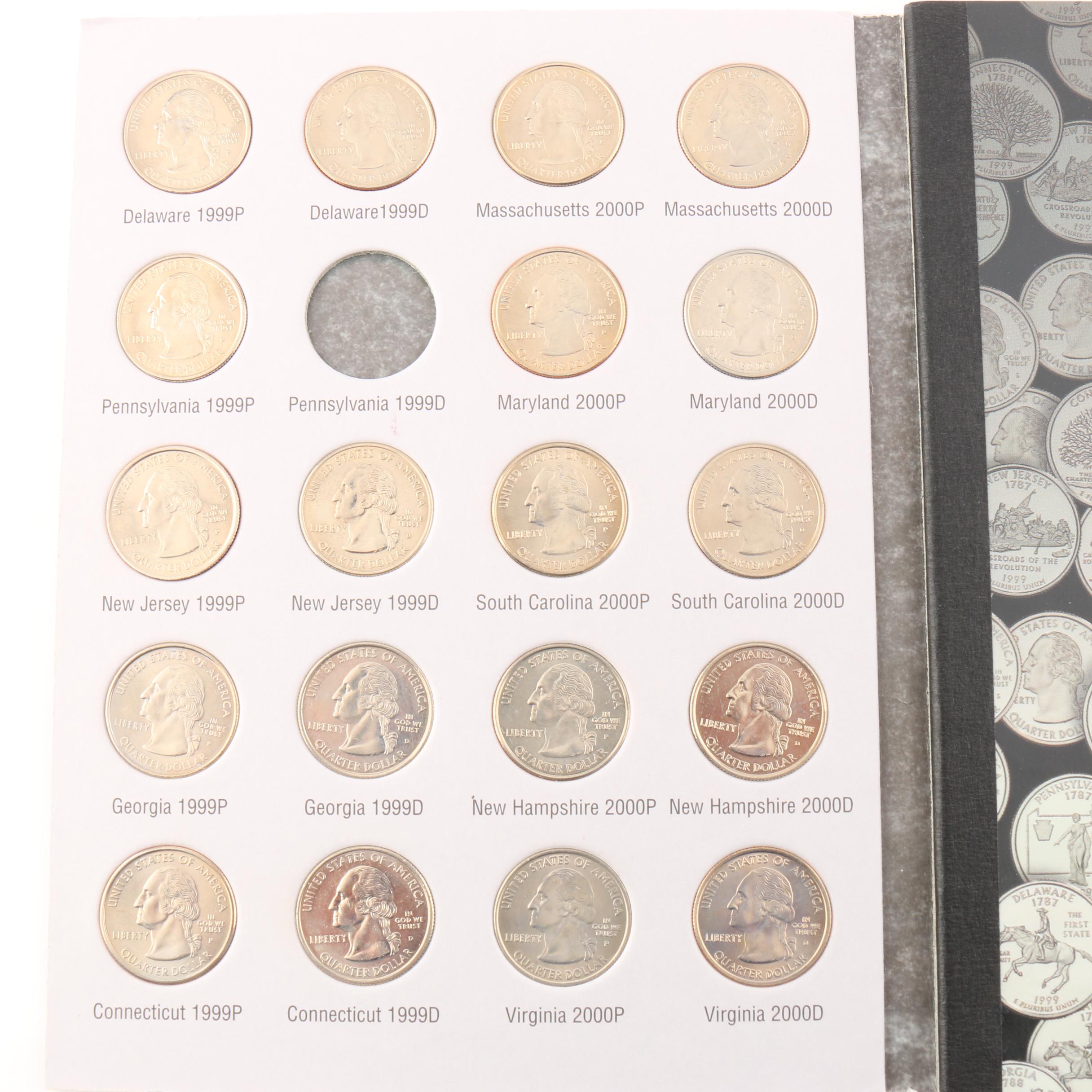 Two Binders of U.S. Statehood Quarters