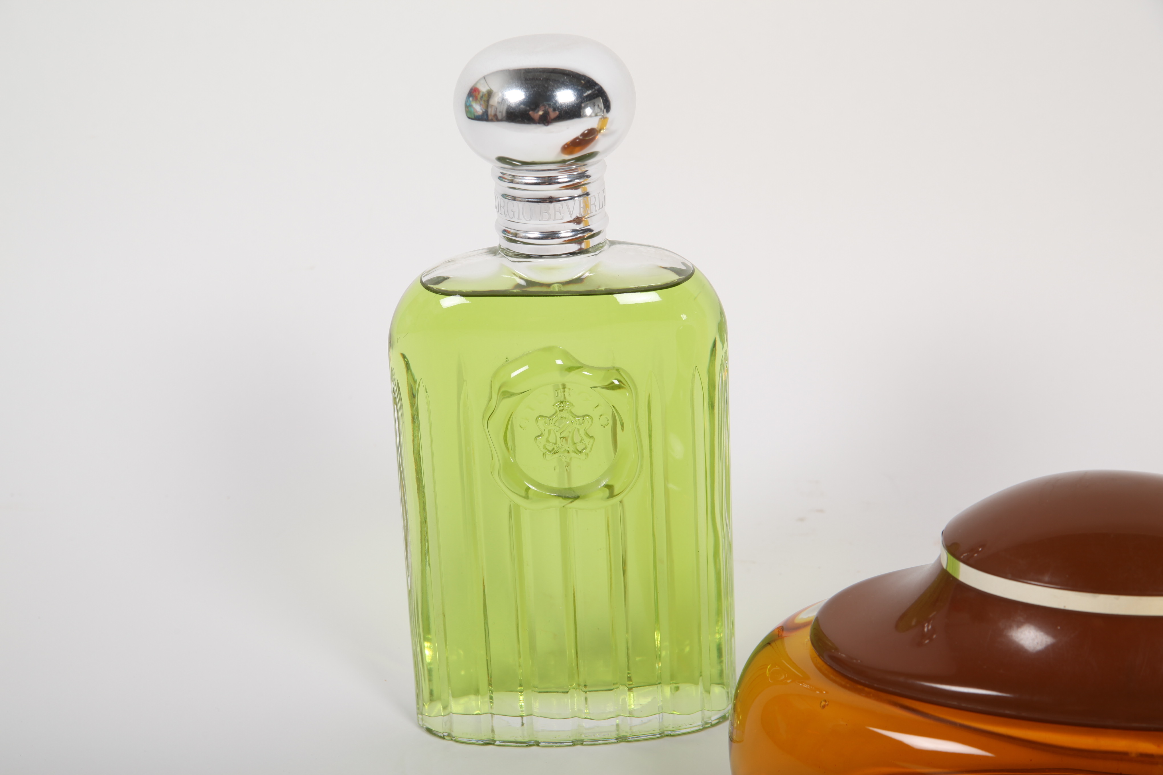 Large Men's Cologne Advertisement Bottles Featuring Calvin Klein