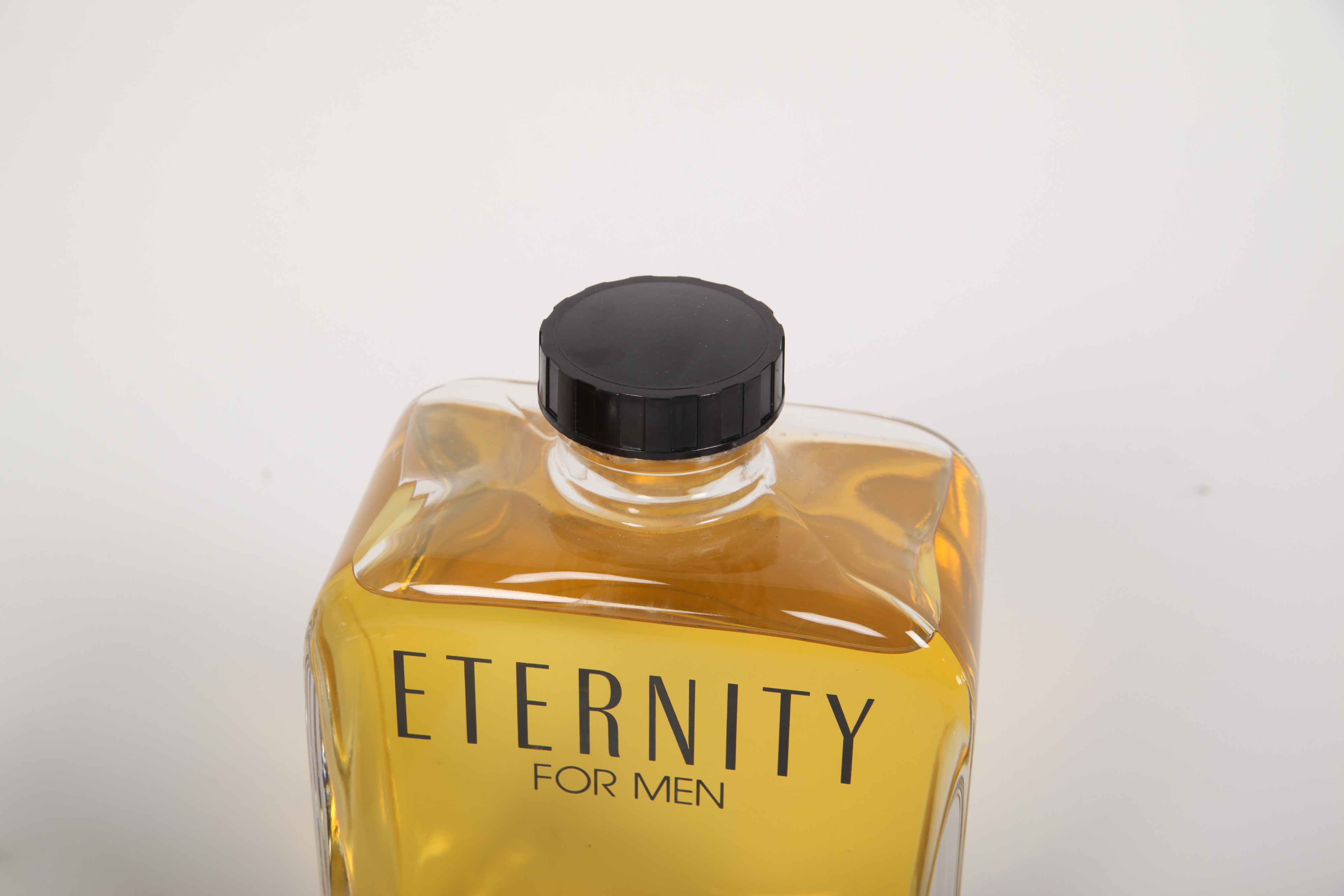 Large Men's Cologne Advertisement Bottles Featuring Calvin Klein