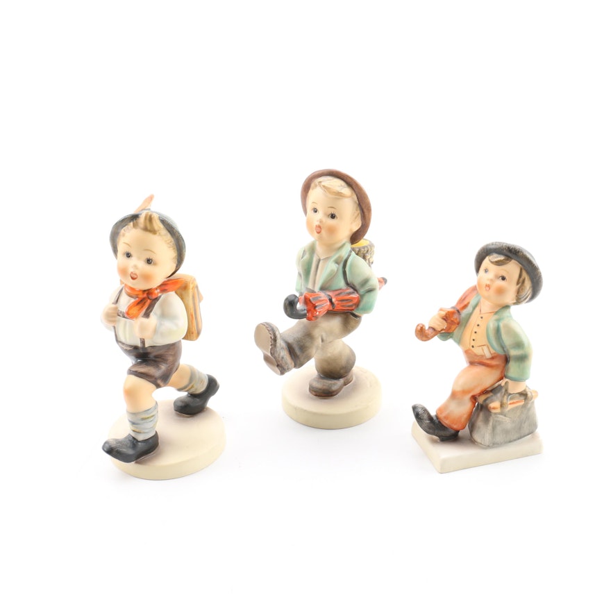 Hummel "Merry Wanderer," "Globe Trotter," and "School Boy" Porcelain Figurines