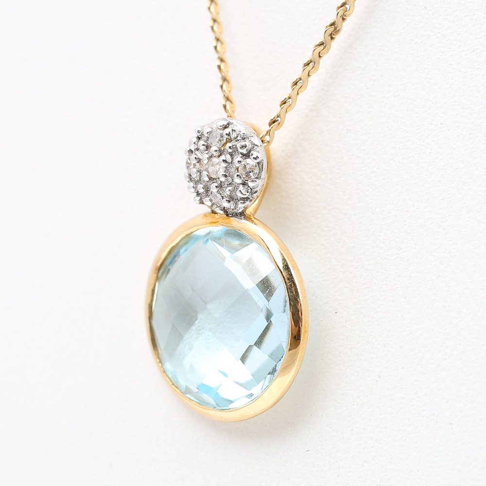 18K Yellow Gold Blue Topaz and Diamond Pendant on a 14K Yellow Gold Chain