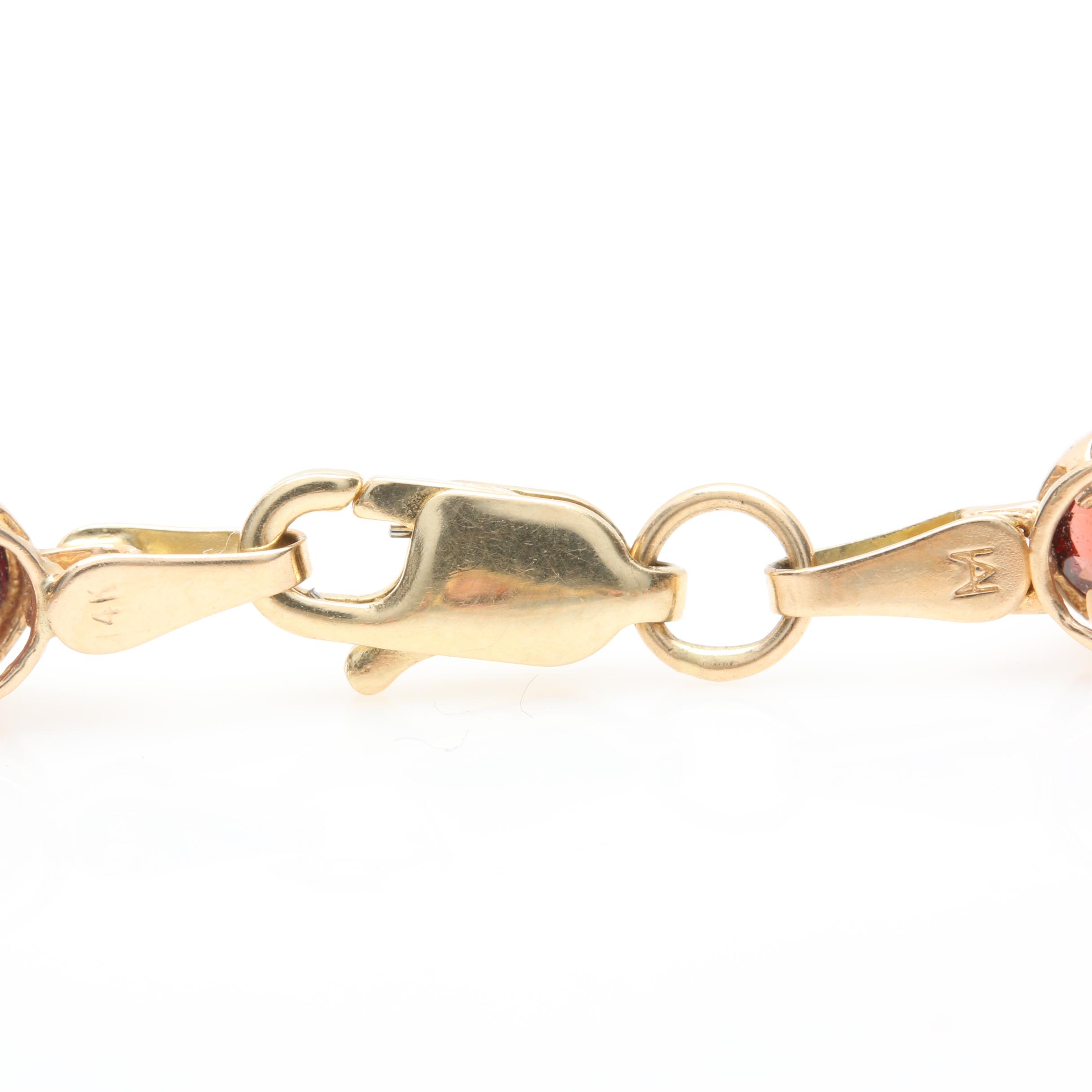 10K and 14K Yellow Gold Garnet Tennis Bracelet
