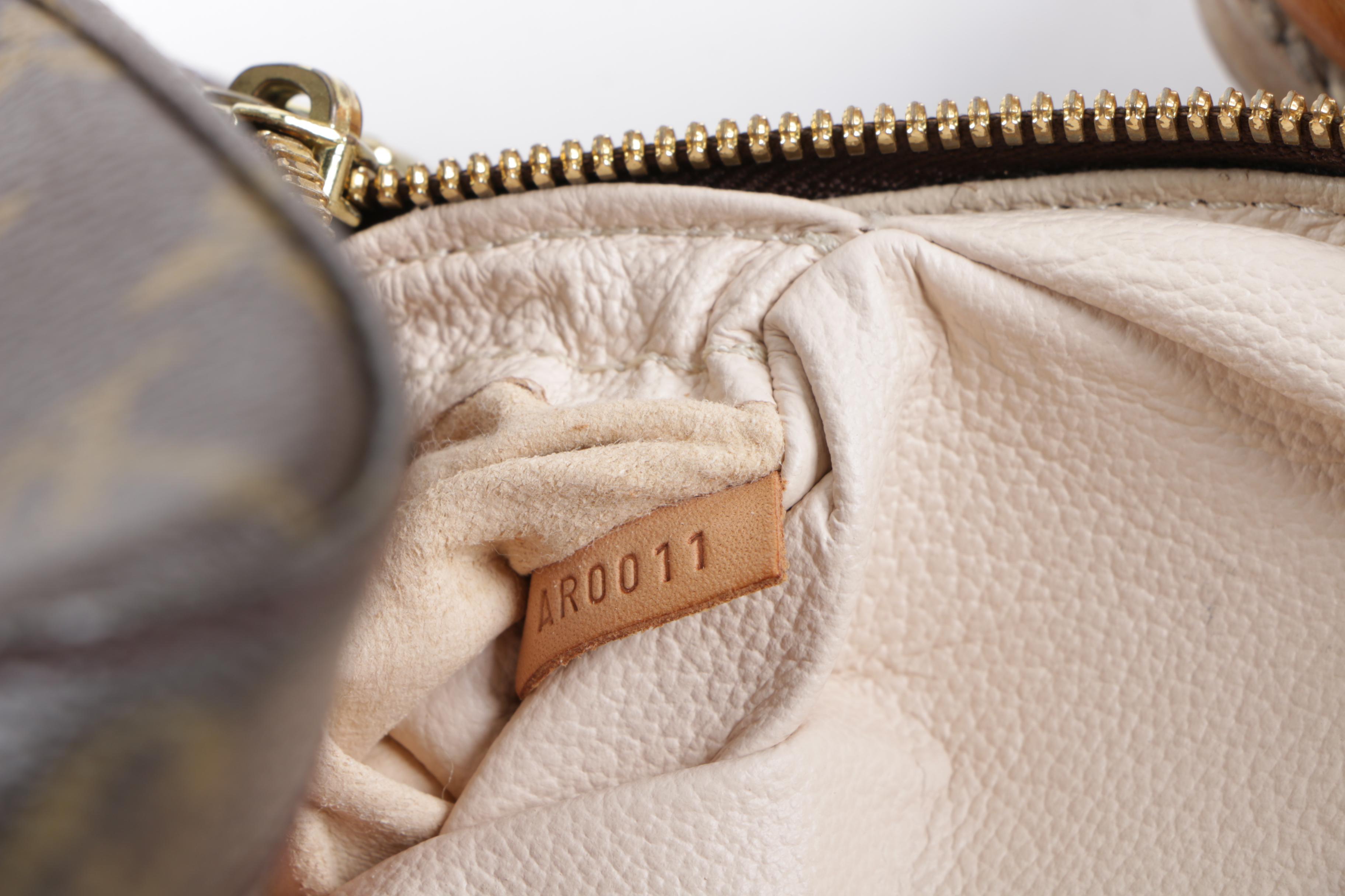 Louis Vuitton Monogram Spontini Handbag