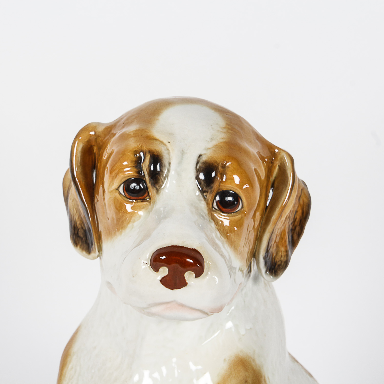 Brown and White Ceramic Dog Figurine