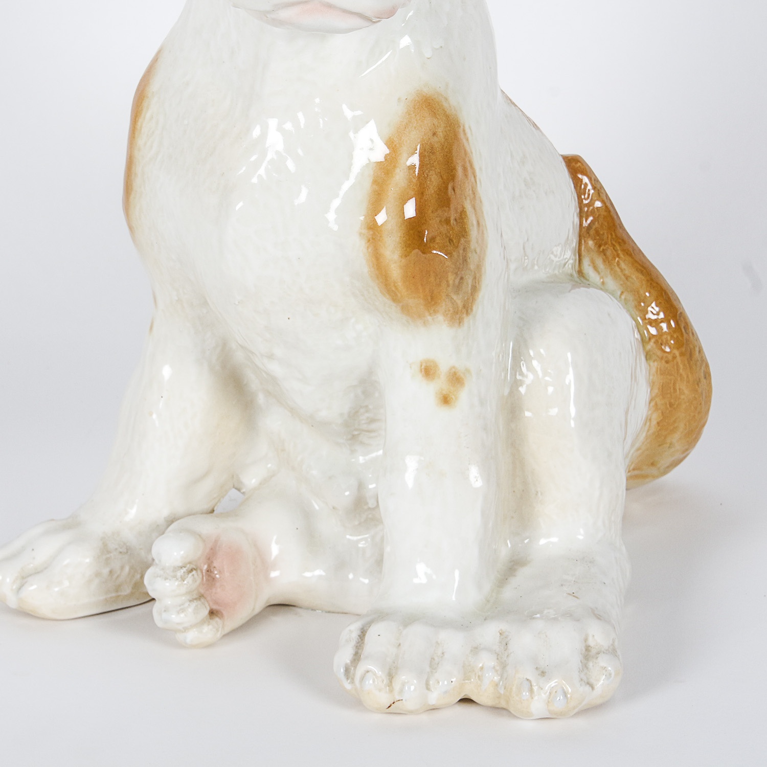 Brown and White Ceramic Dog Figurine