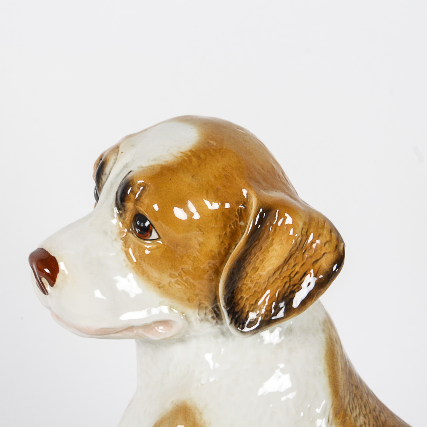 Brown and White Ceramic Dog Figurine