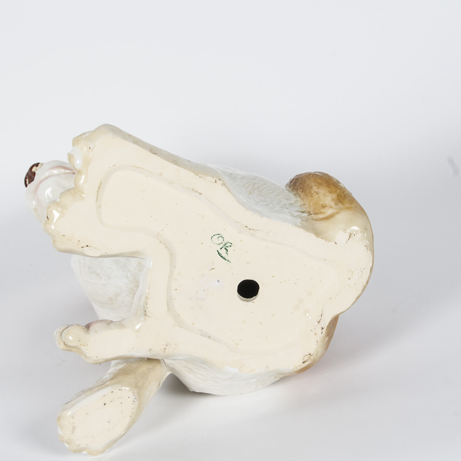 Brown and White Ceramic Dog Figurine