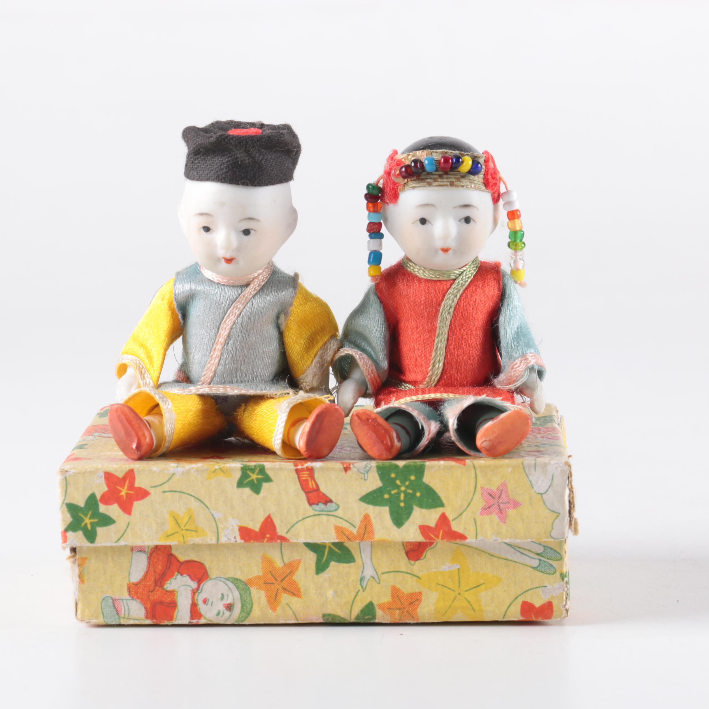 Pair of Wooden China Sleeping Dolls