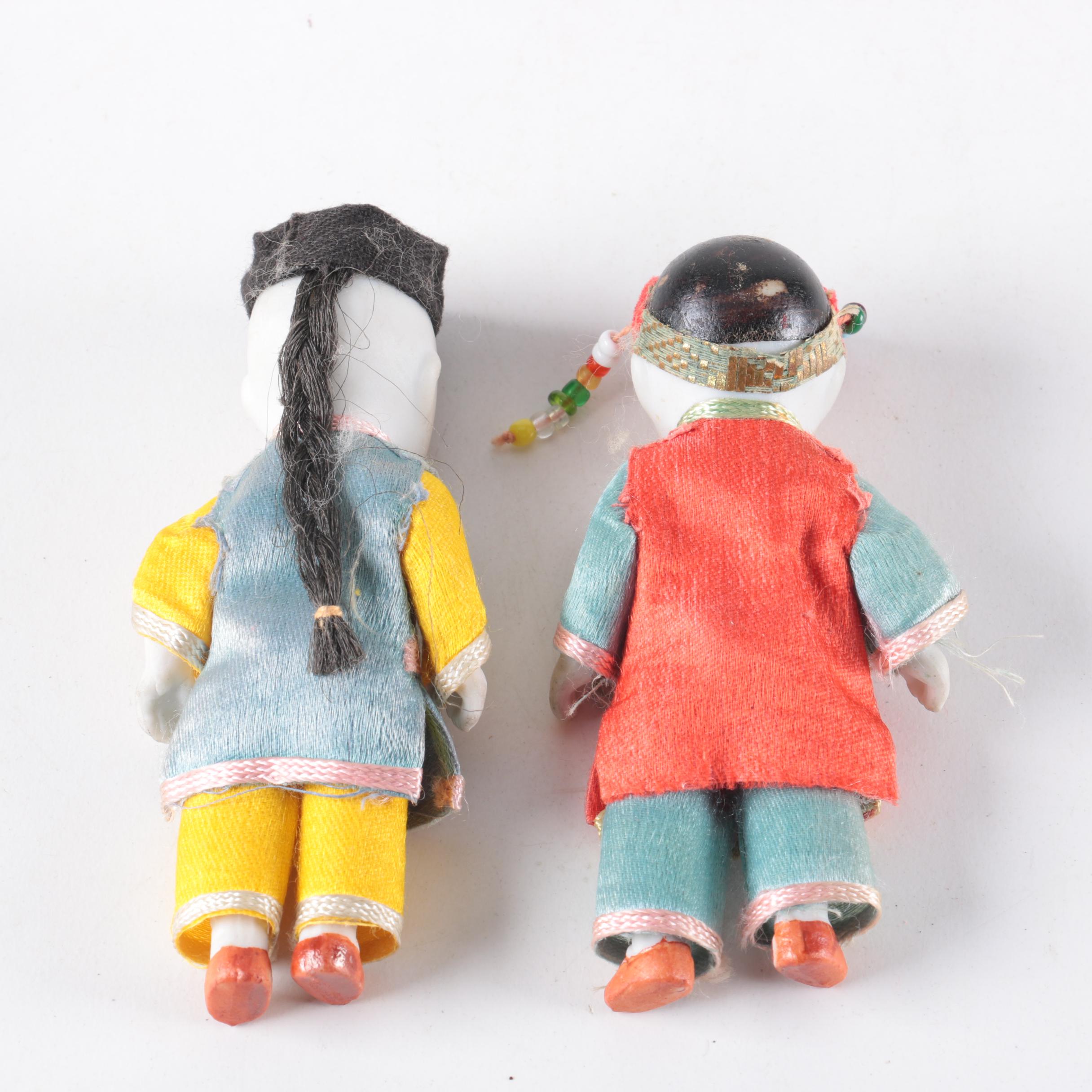 Pair of Wooden China Sleeping Dolls