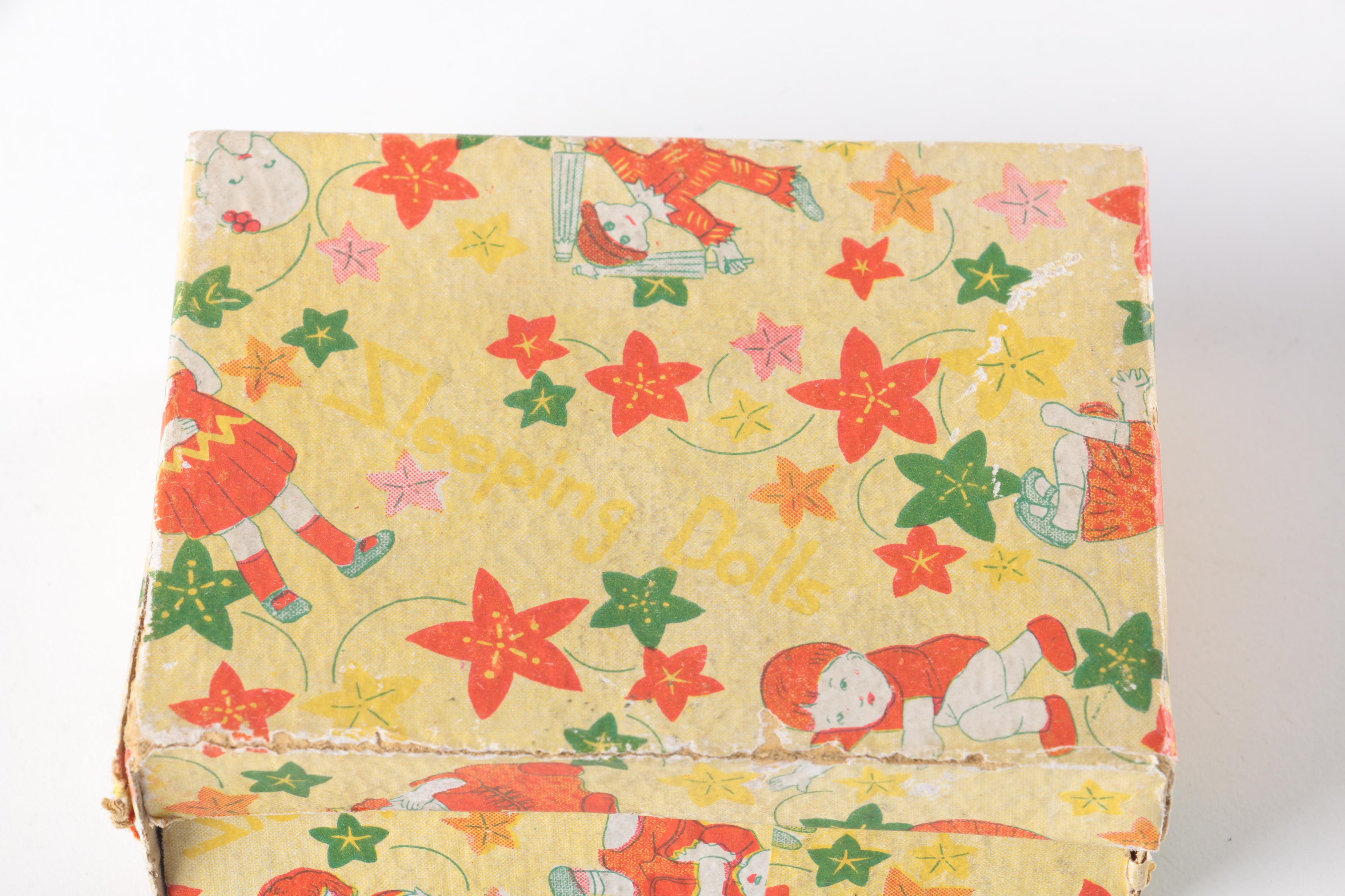 Pair of Wooden China Sleeping Dolls