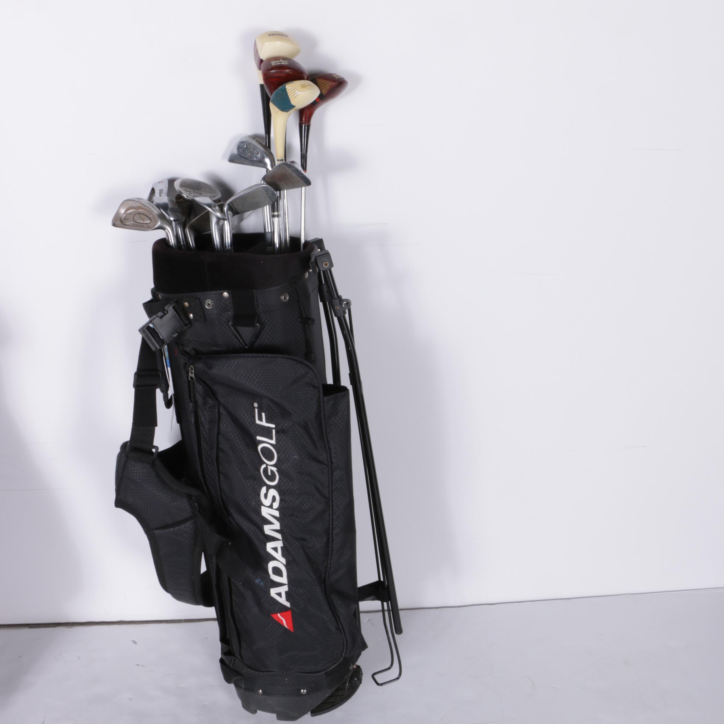 Various Golf Clubs with a Pair of Cases