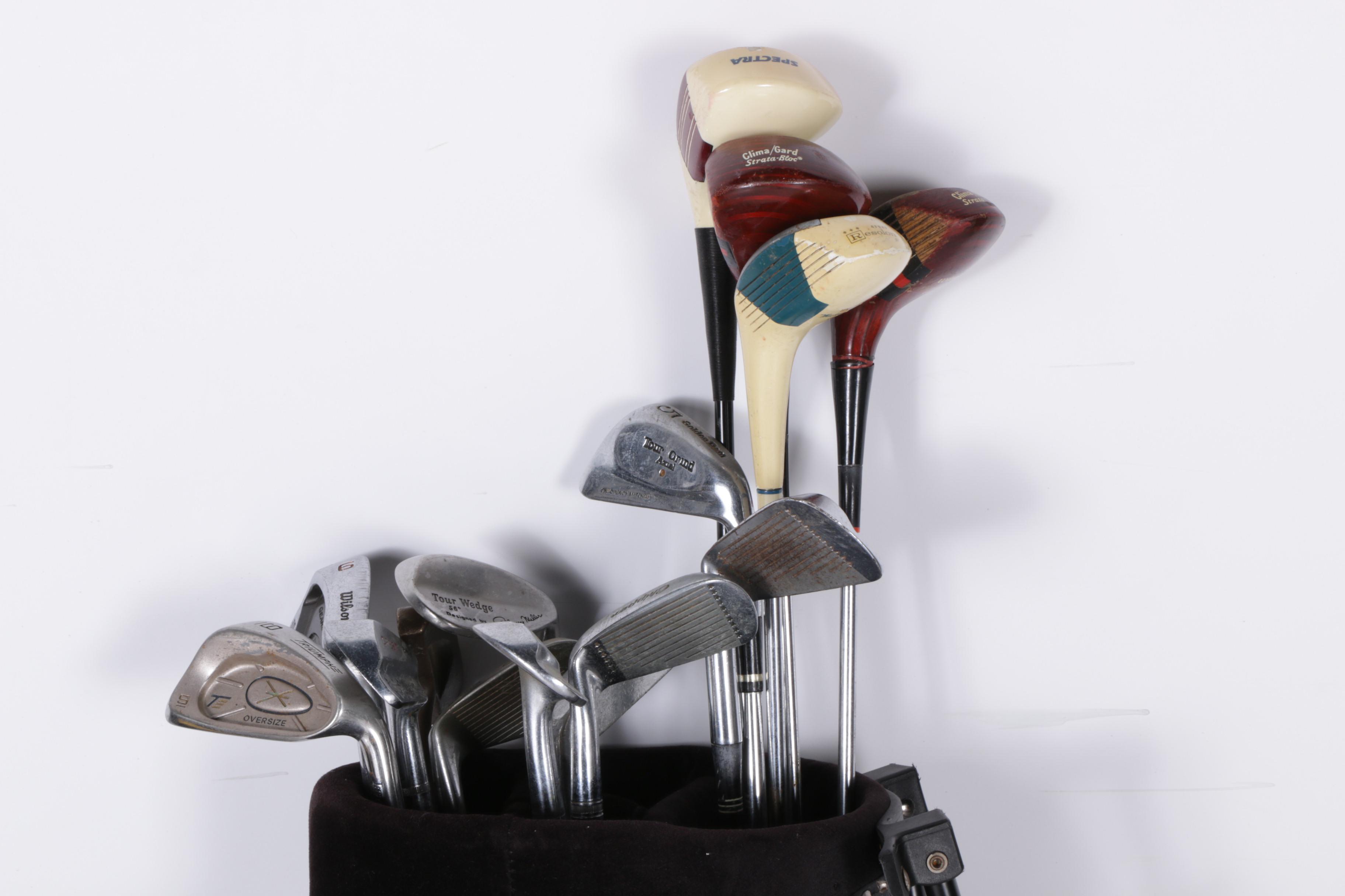 Various Golf Clubs with a Pair of Cases