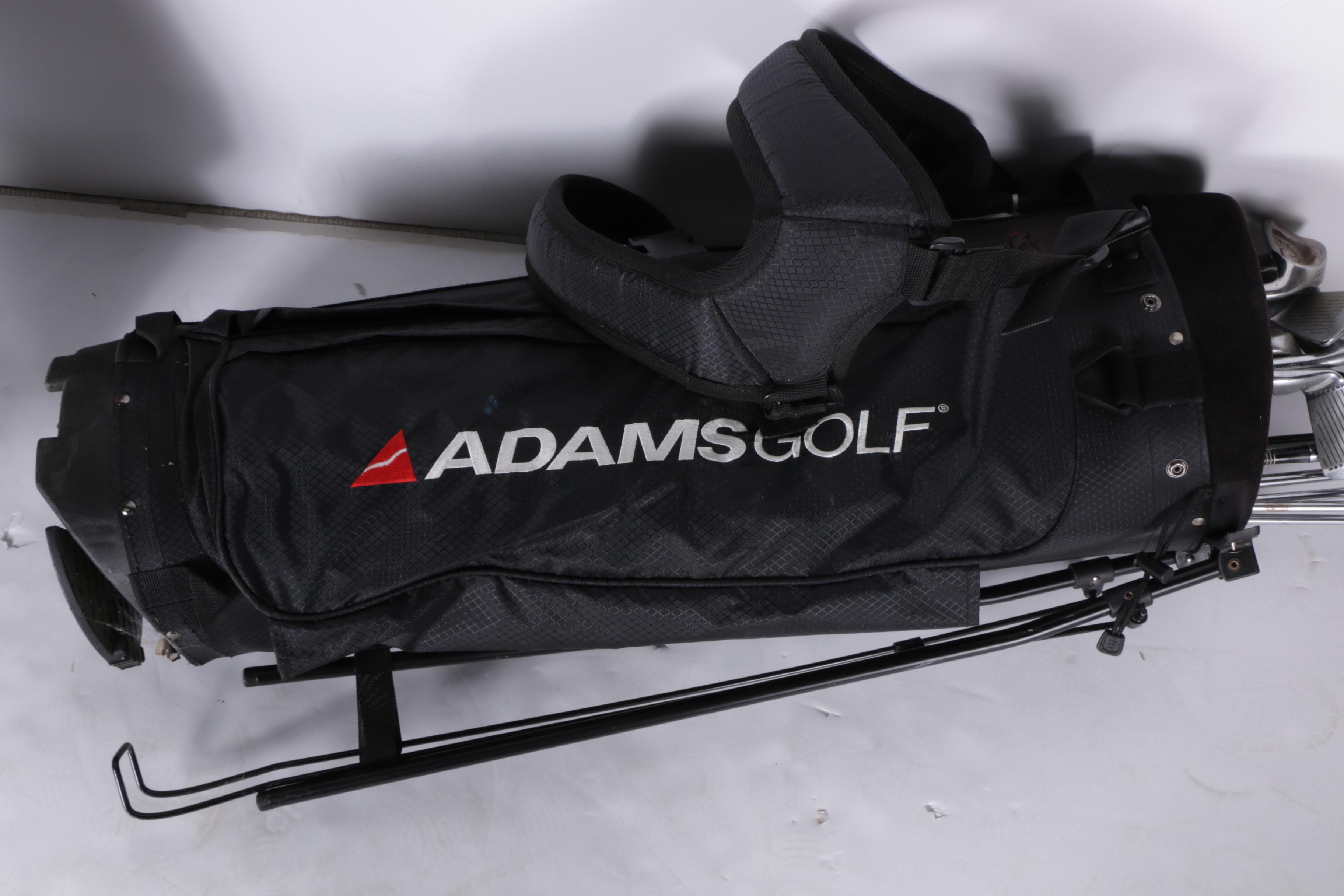 Various Golf Clubs with a Pair of Cases