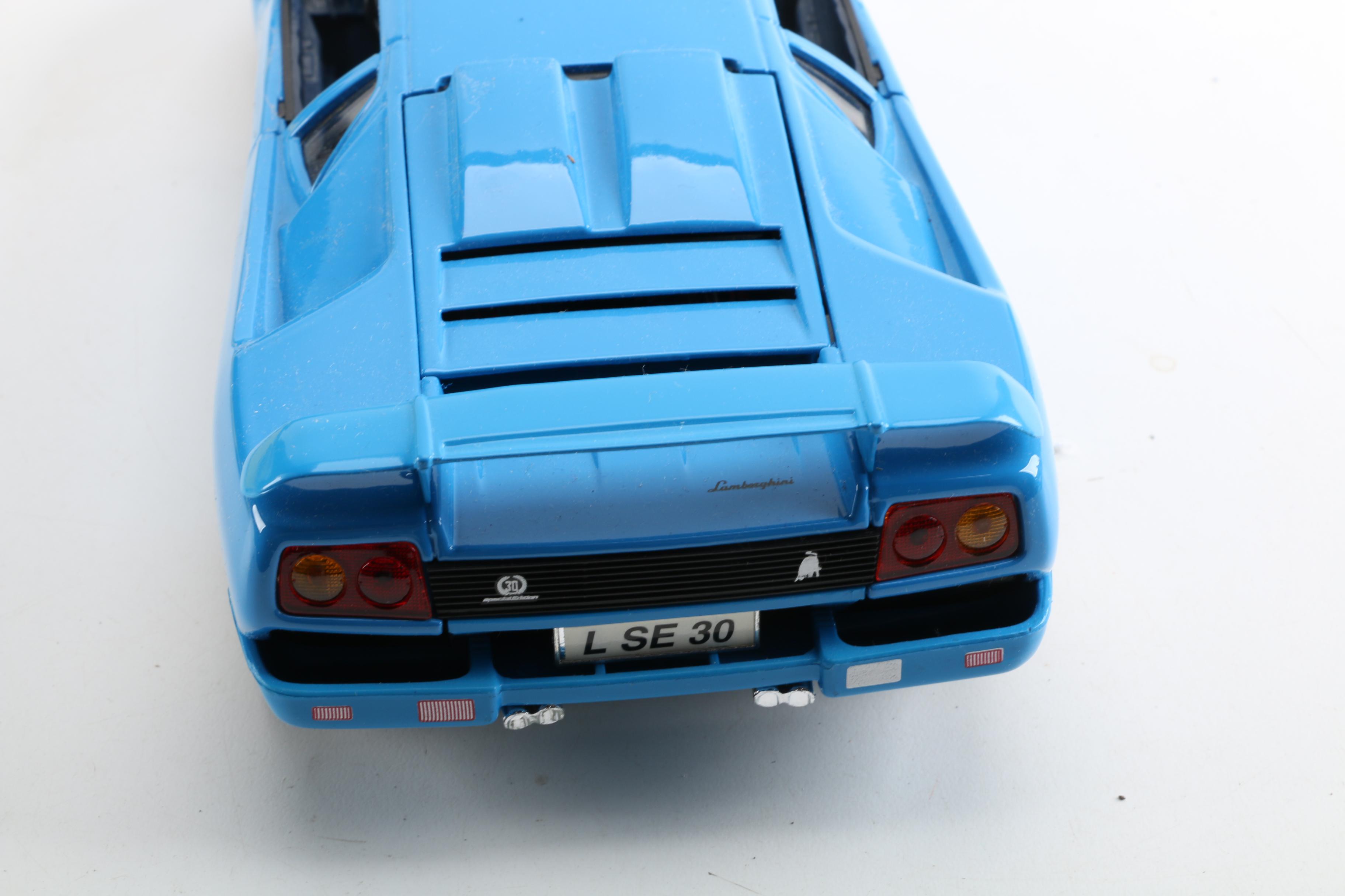 Die-Cast Cars Including Maisto