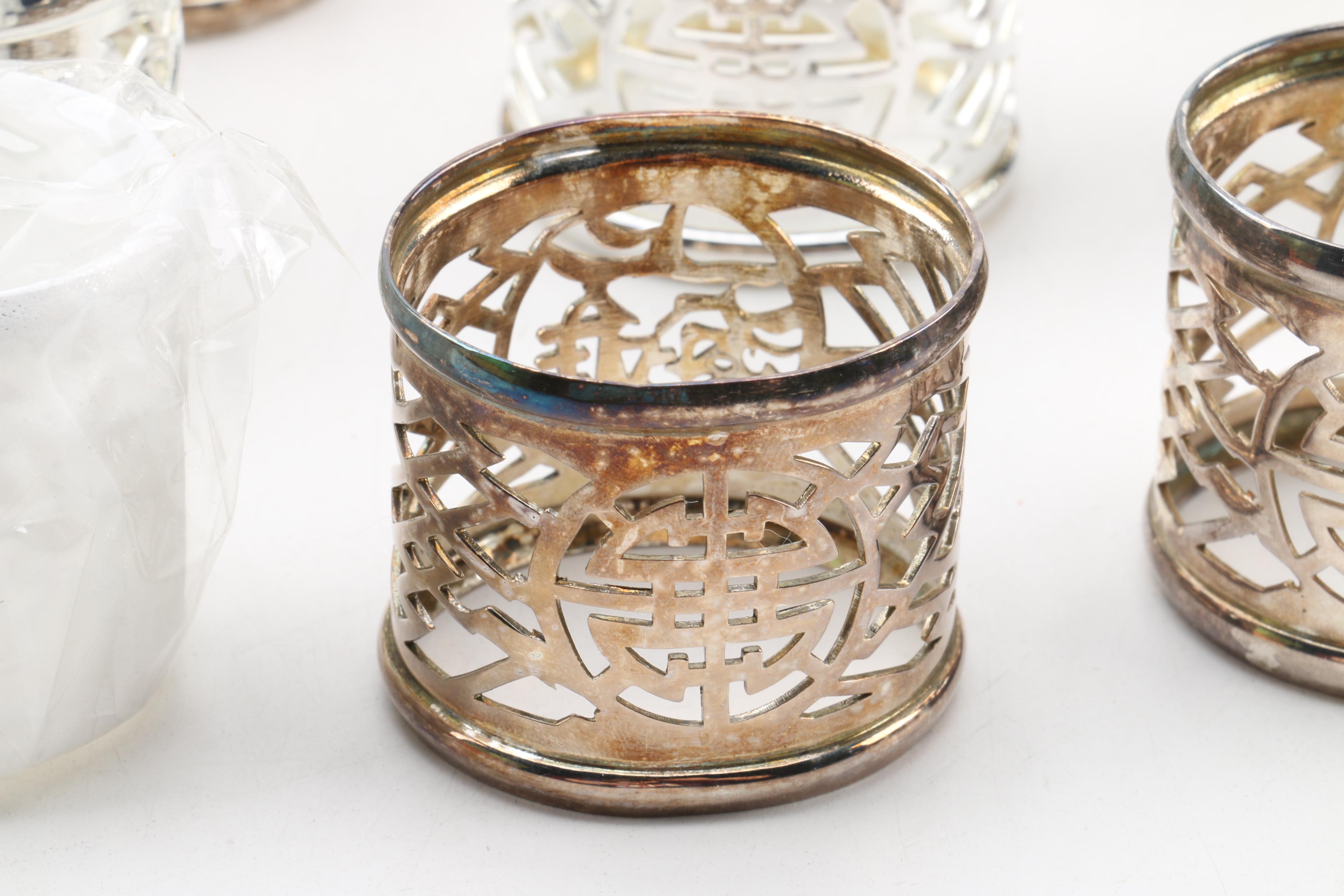 Collection of Three Sets of Napkin Rings