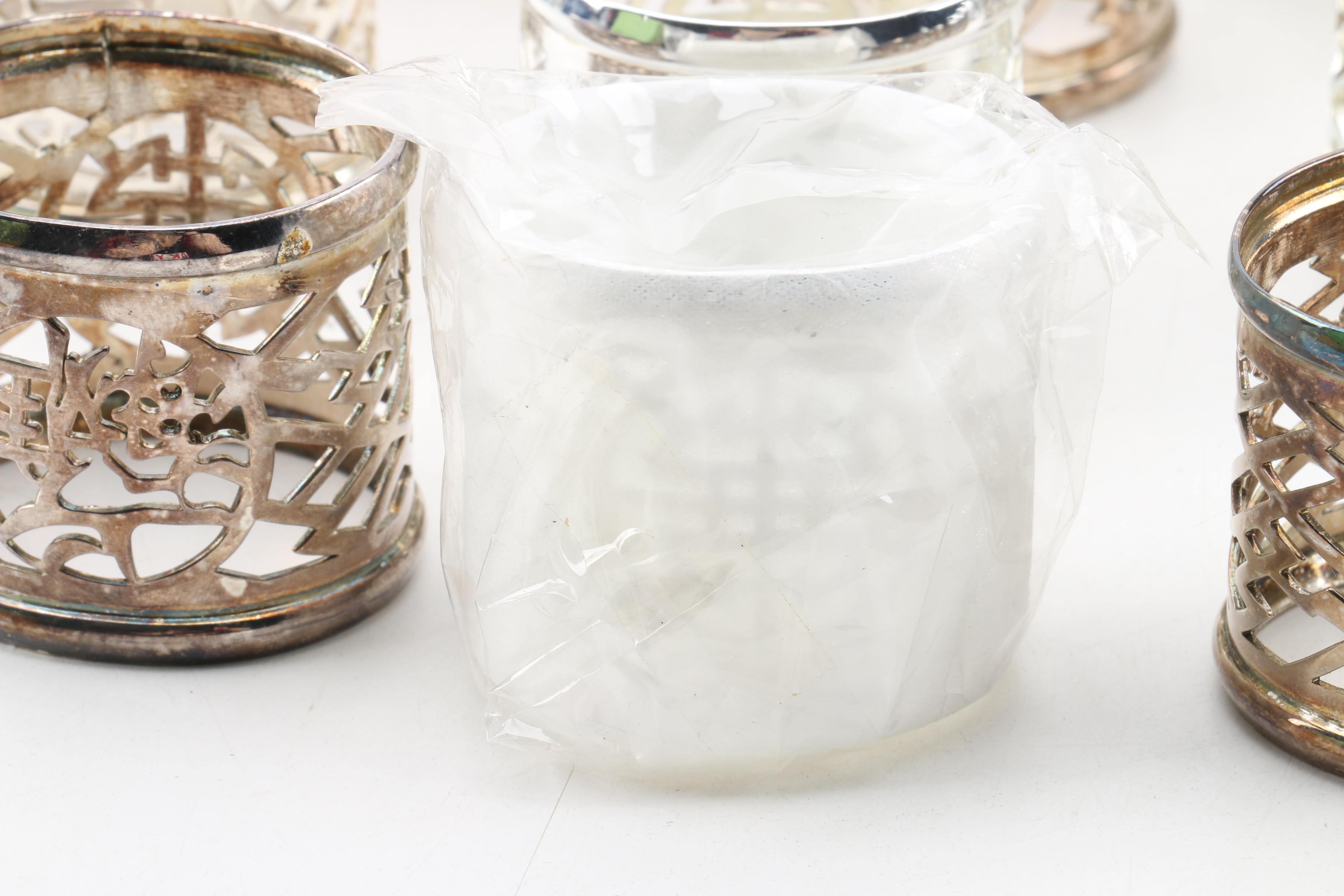 Collection of Three Sets of Napkin Rings