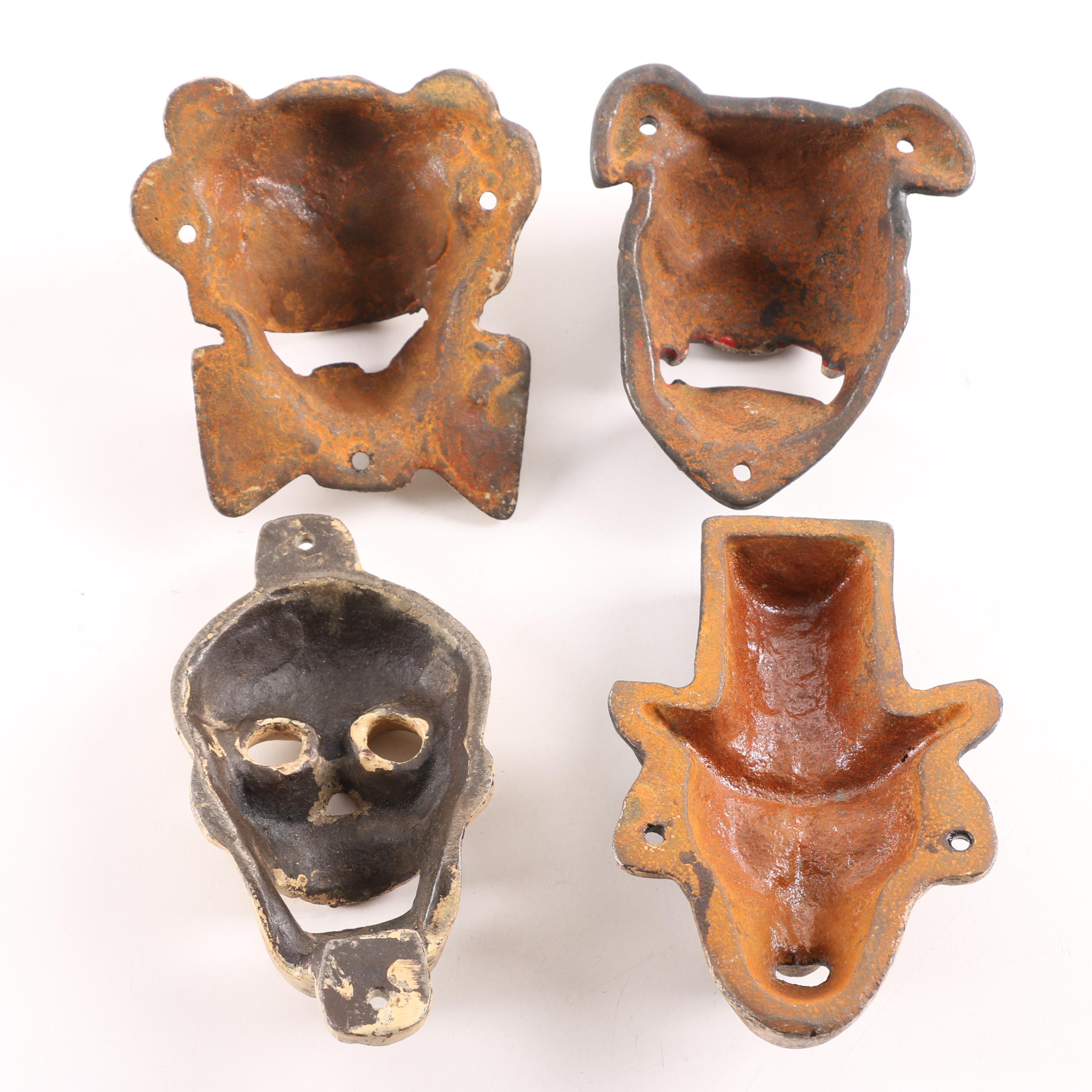 Cast Iron Face Bottle Openers Including Clown, Dog, Skull and Man c. 1930