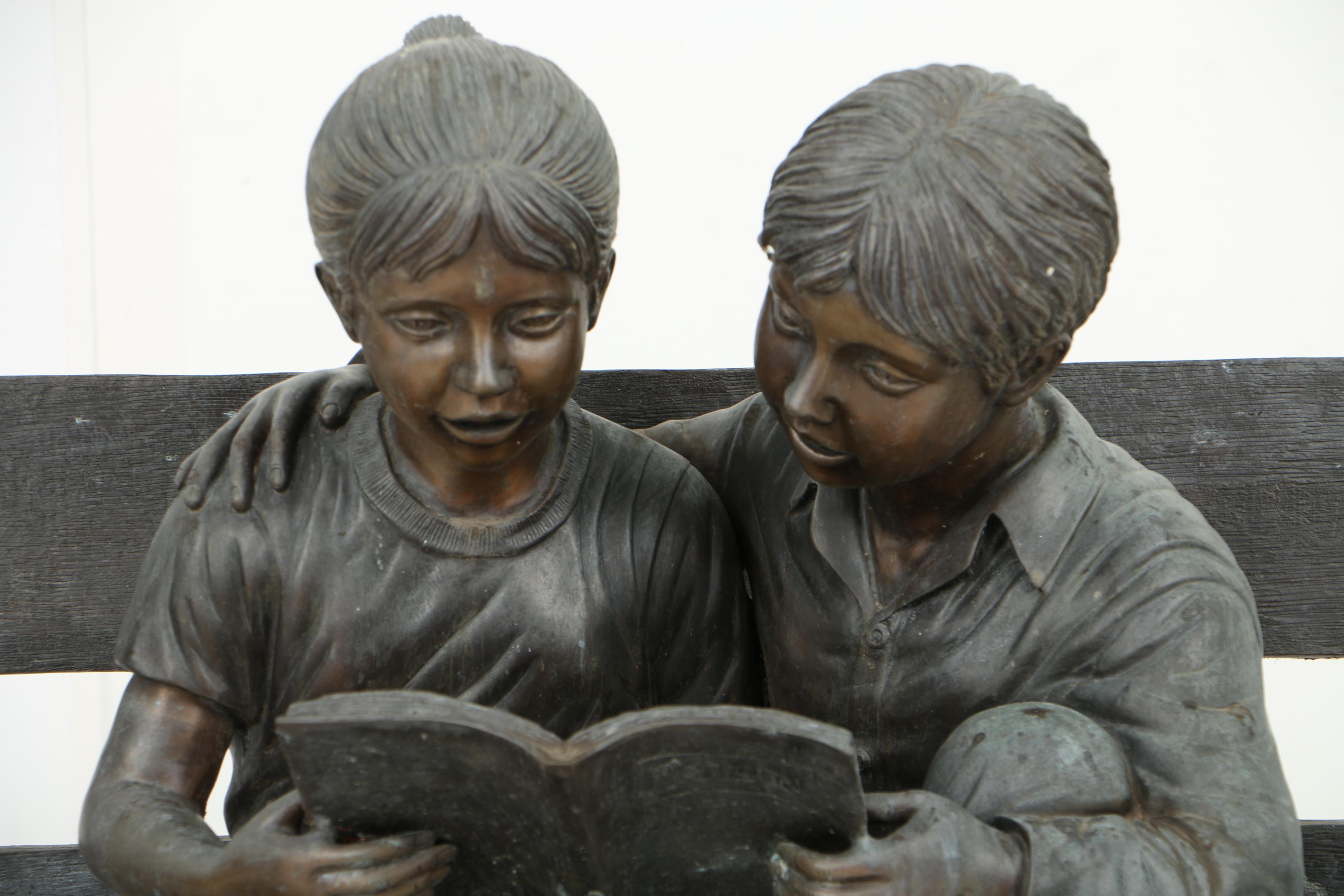 Patinated Leaded Brass Garden Sculpture of Two Children Reading on a Bench
