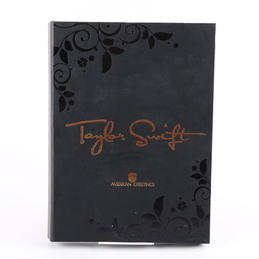 Autographed Taylor Swift "Fearless Platinum Edition" CD and Fearless Tour Book