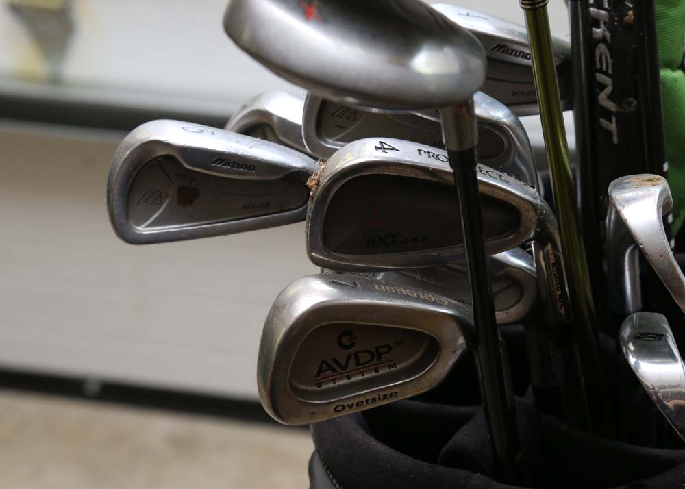 A Set of Various Golf Clubs With Callaway Bag