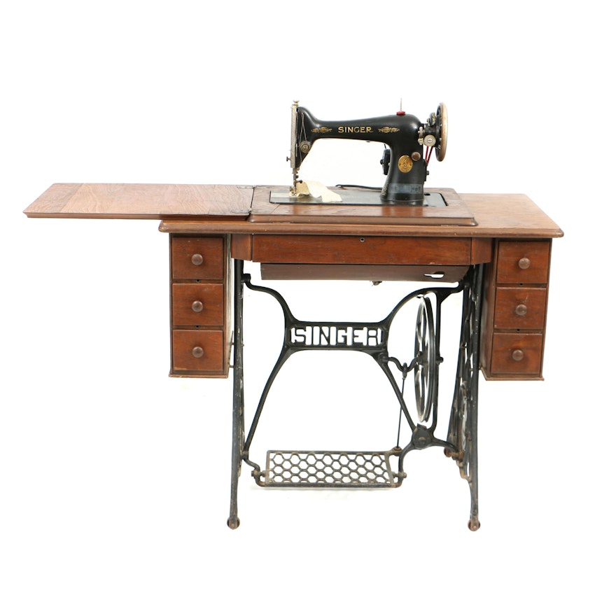 Early 20th Century Singer Sewing Machine with Treadle Table and Attachments
