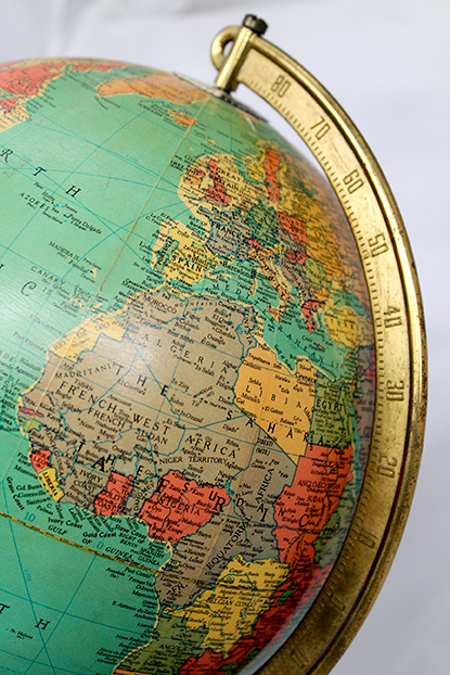 Vintage Illuminated Globe with "Replogle World Atlas" Book