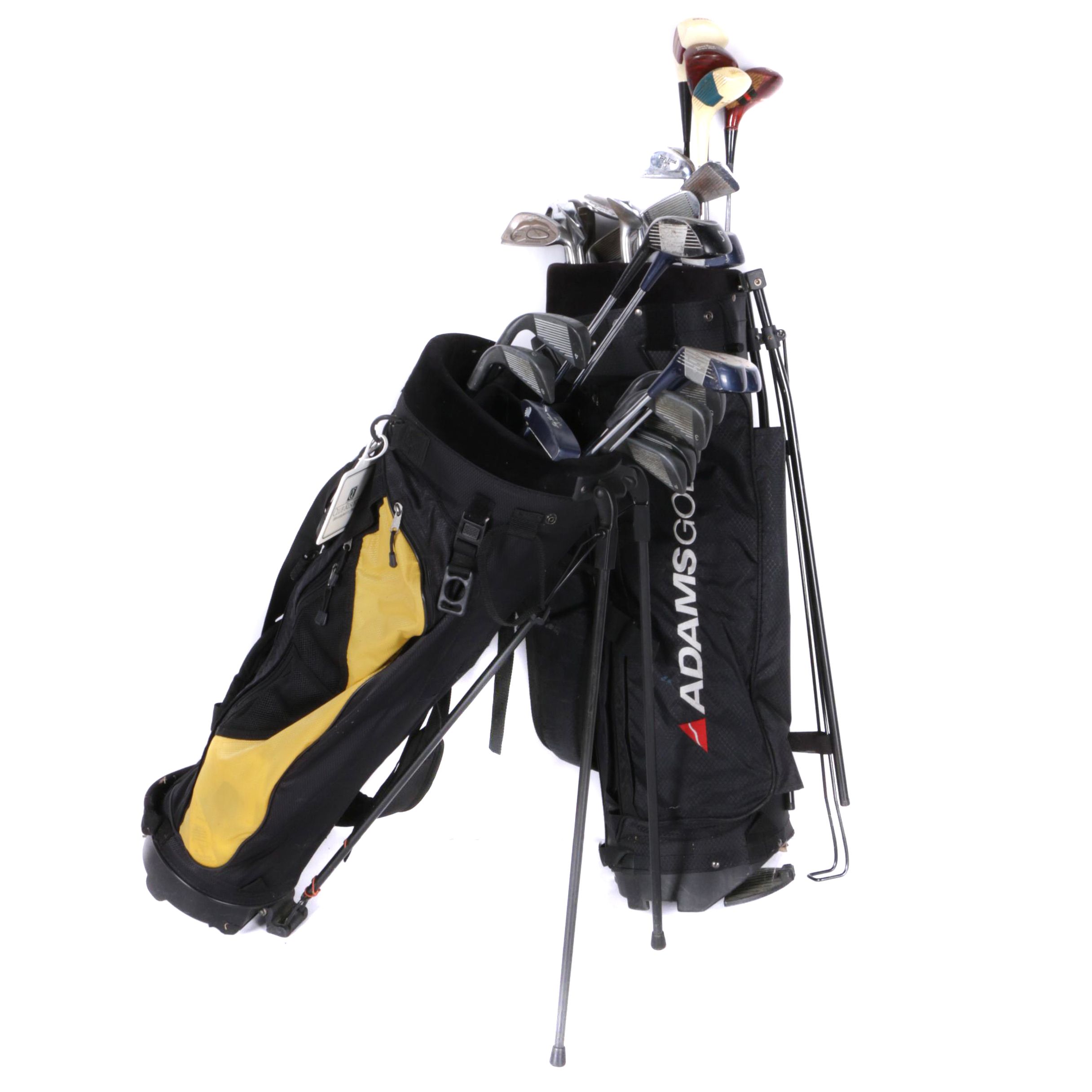 Various Golf Clubs with a Pair of Cases