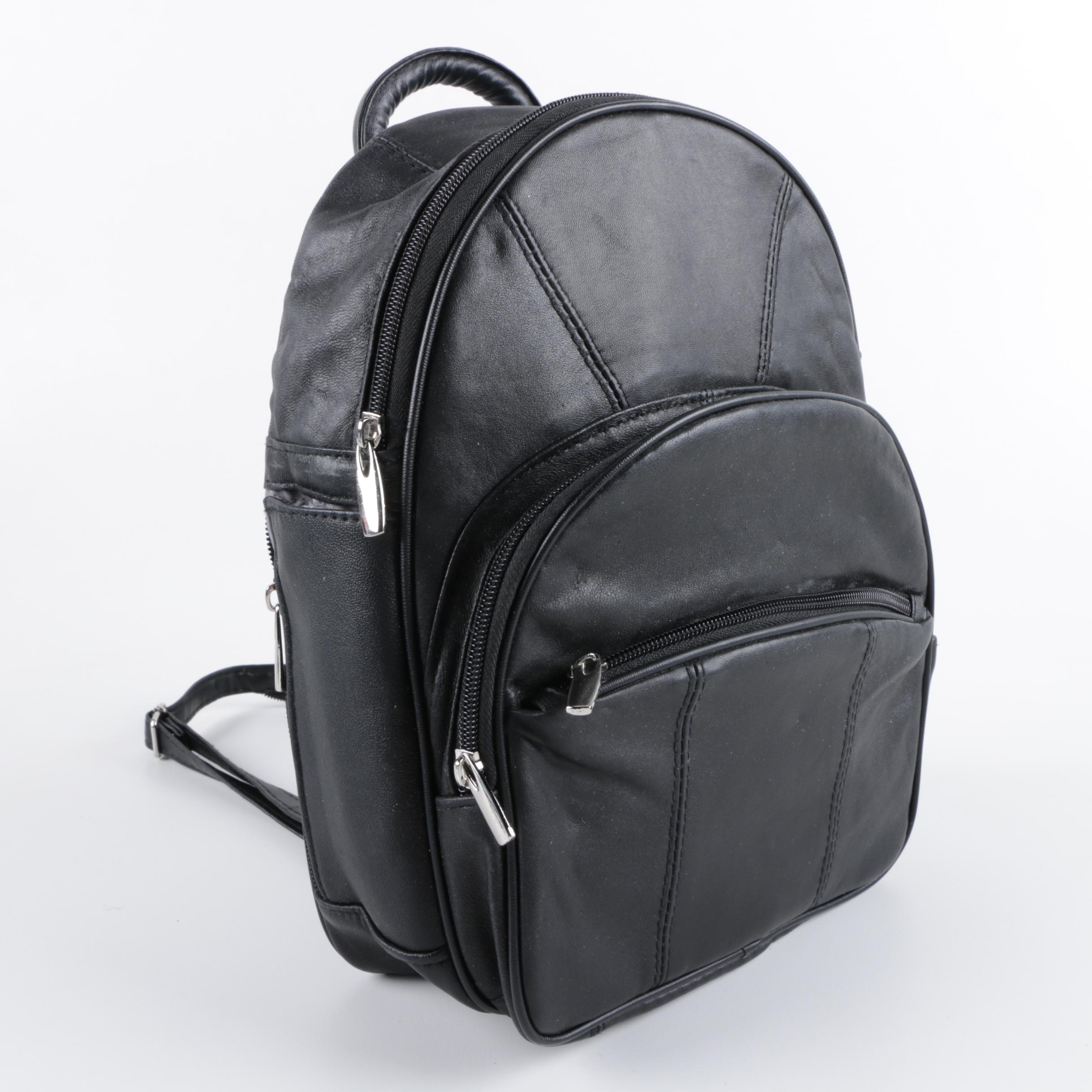 Black Leather Backpack and Blue Crossbody Bags