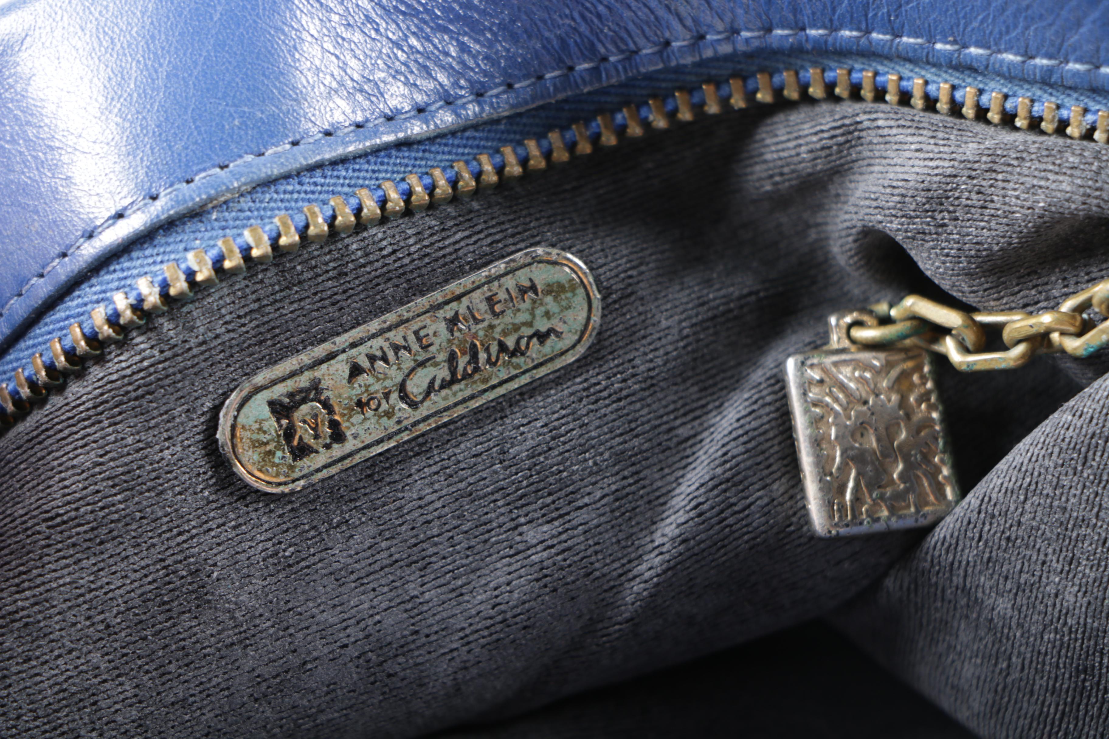 Black Leather Backpack and Blue Crossbody Bags