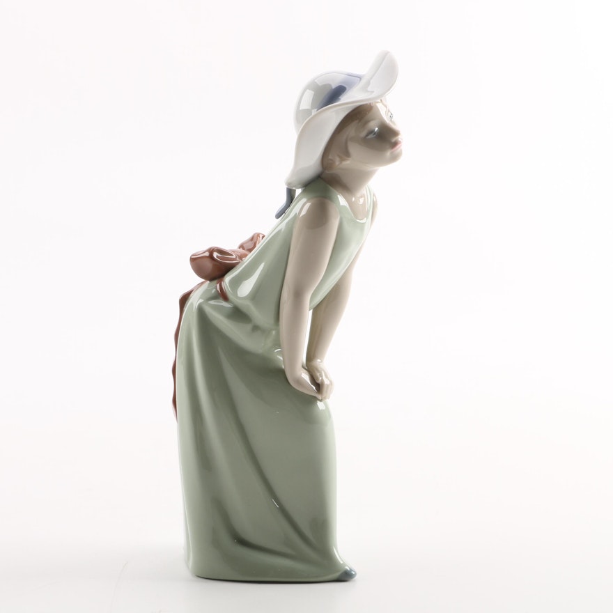 Lladro Leaning Girl in Hat Figurine