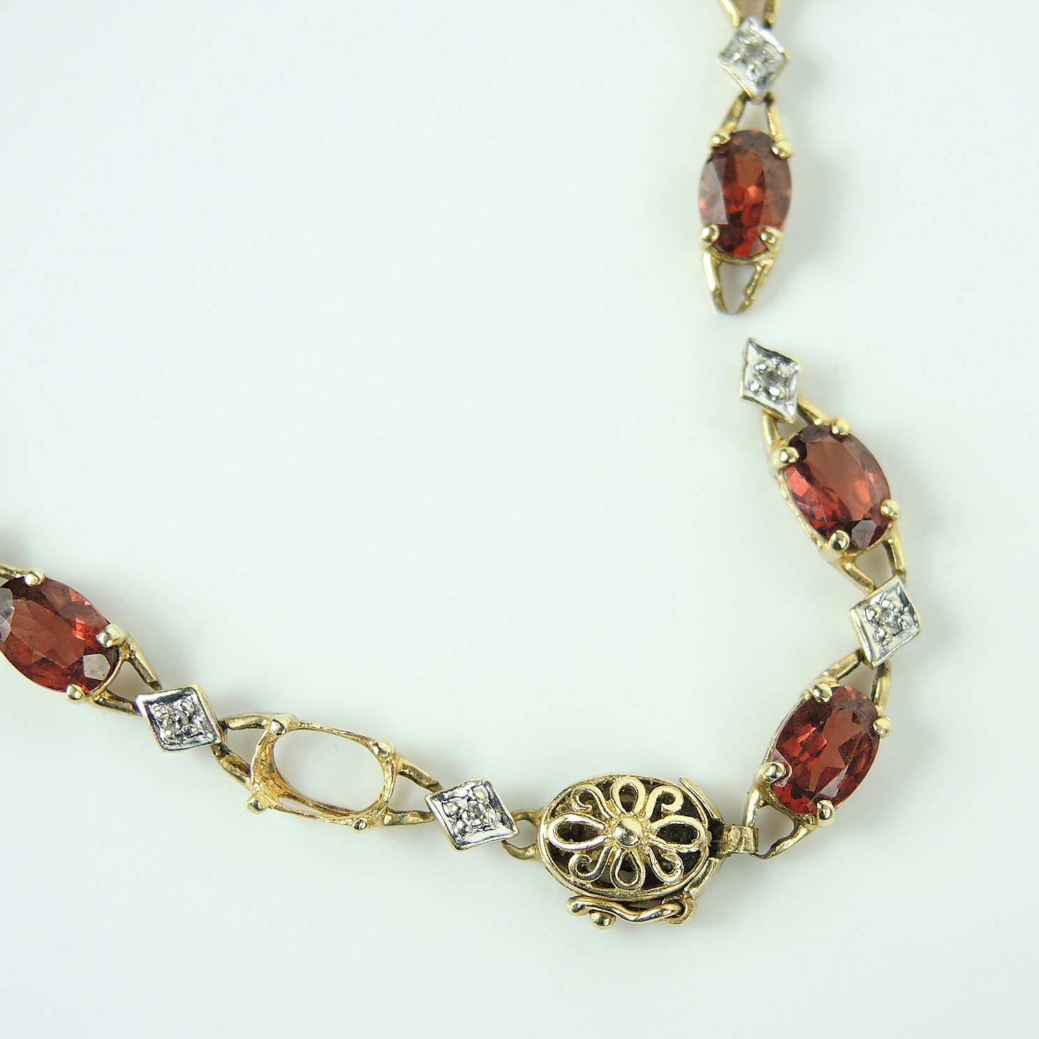 10K Gold Garnet Bracelet and Aquamarine Pendant with Diamonds