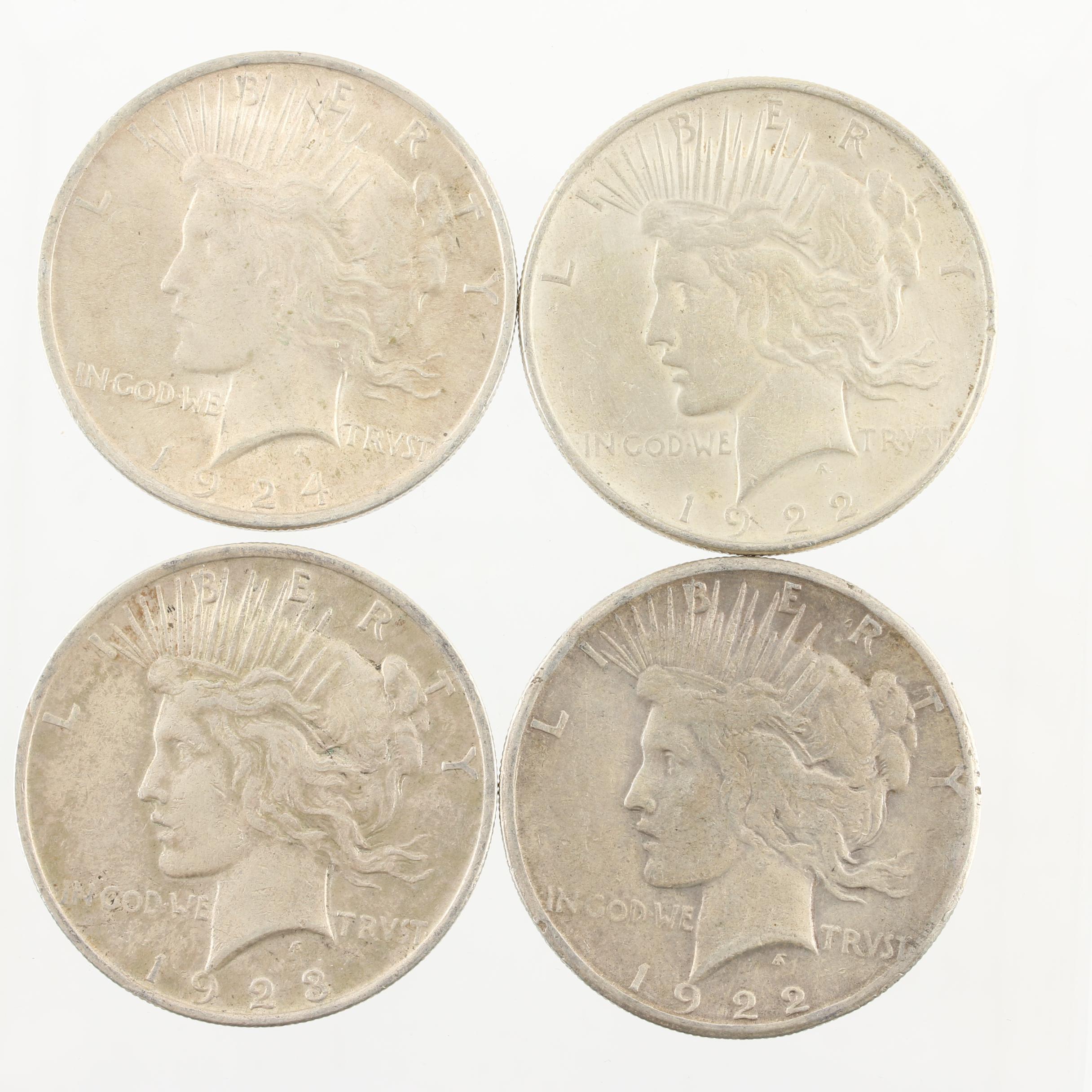 Four Peace Silver Dollars