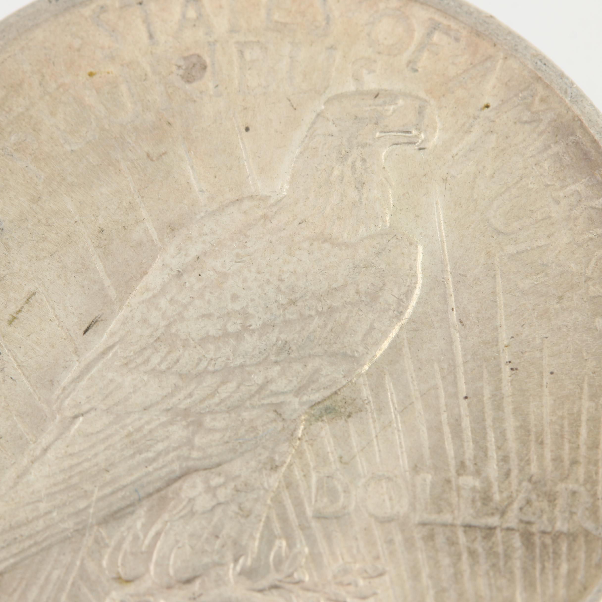 Four Peace Silver Dollars