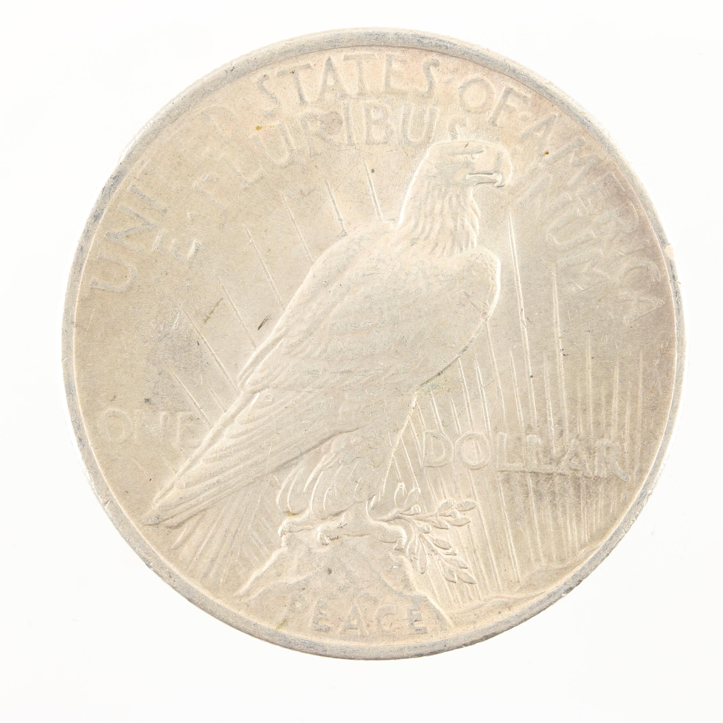 Four Peace Silver Dollars