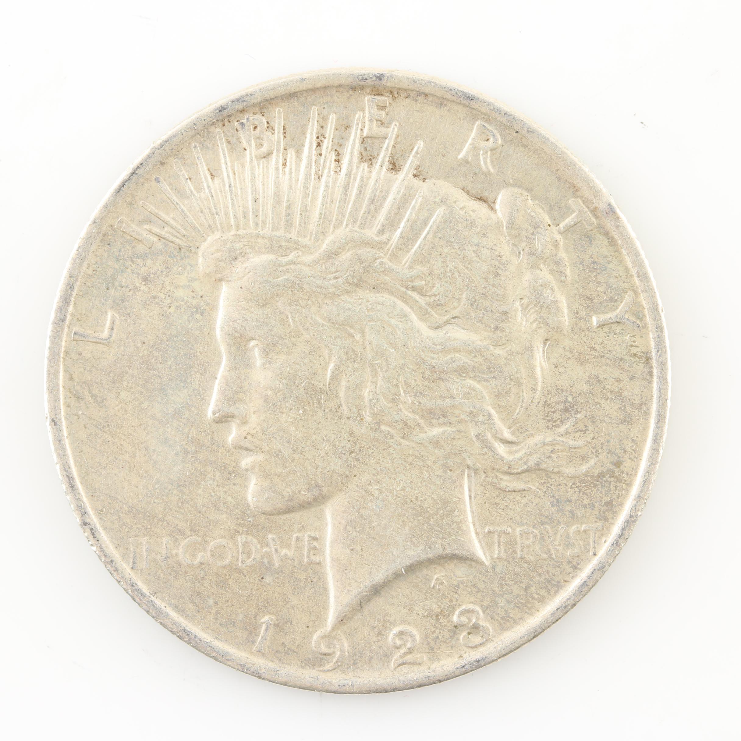 Four Peace Silver Dollars